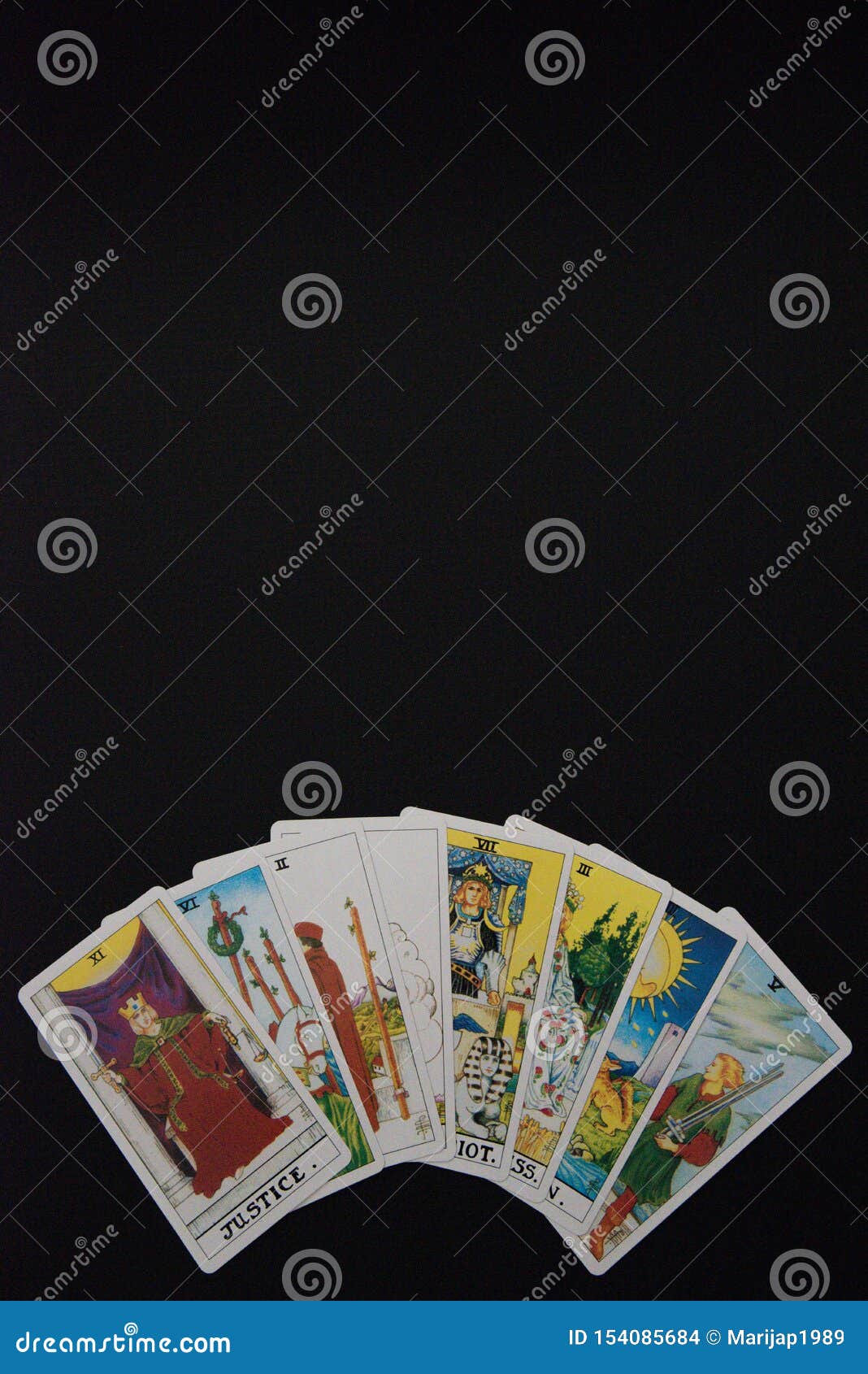 Tarot Cards Placed on the Bottom of the Image. Stock Photo Image of