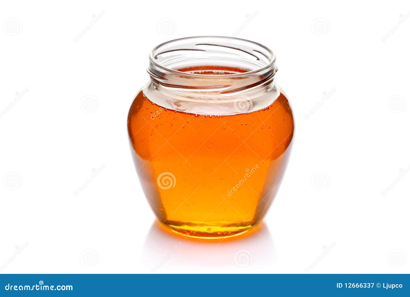 Tarro de miel imagen de archivo. Imagen de fondo, remedio - 12666337