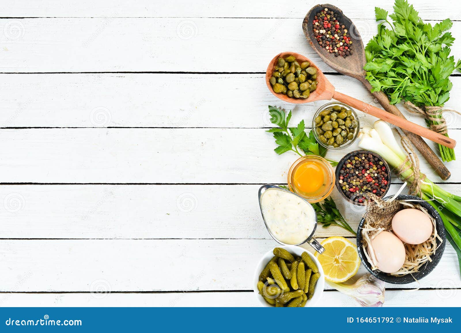 Tartar Sauce. Making Sauce from Capers, Cucumbers, Parsley, Lemon and