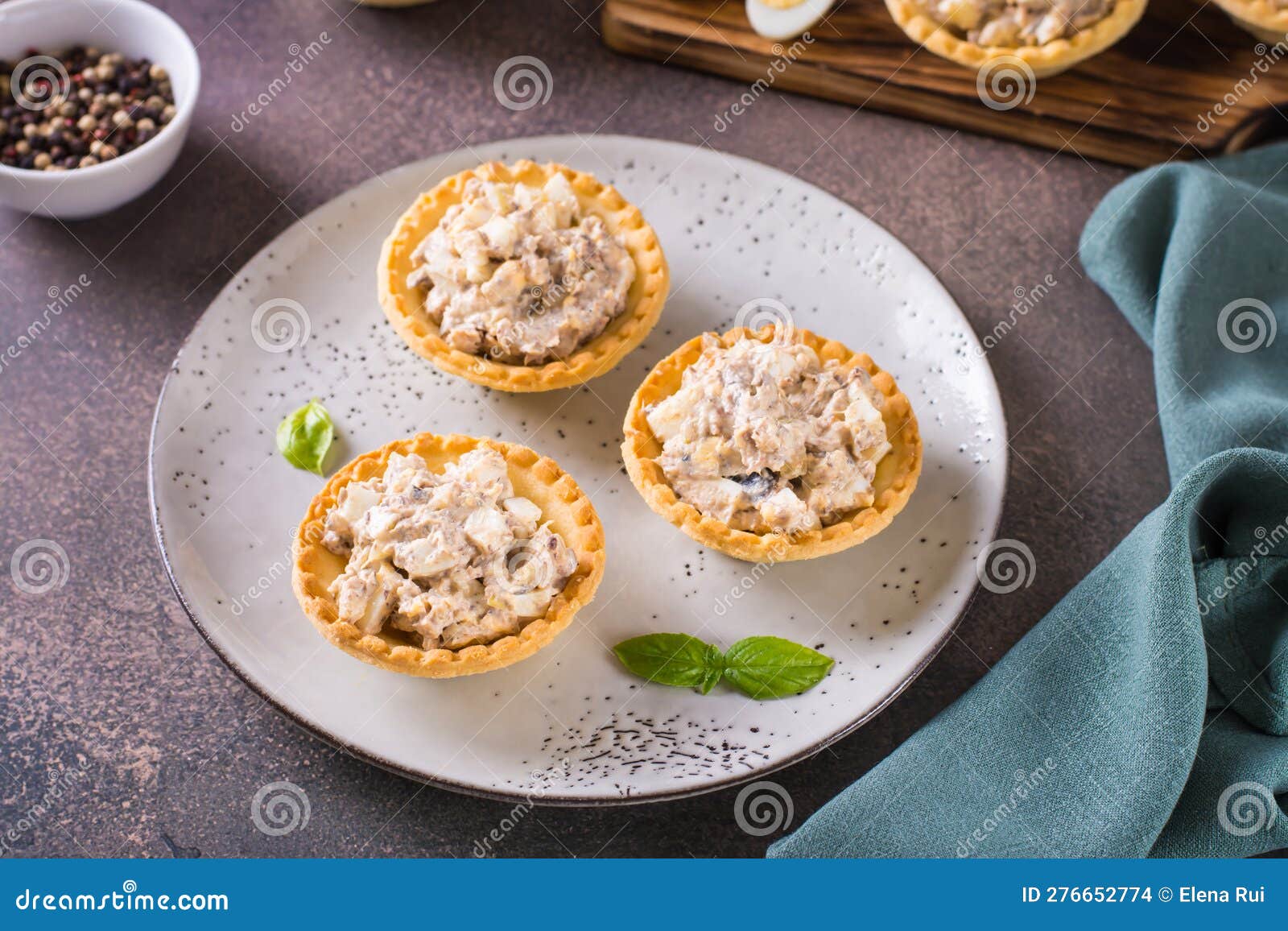 Tartlets Filled with Canned Fish, Eggs and Mayonnaise on a Plate Stock