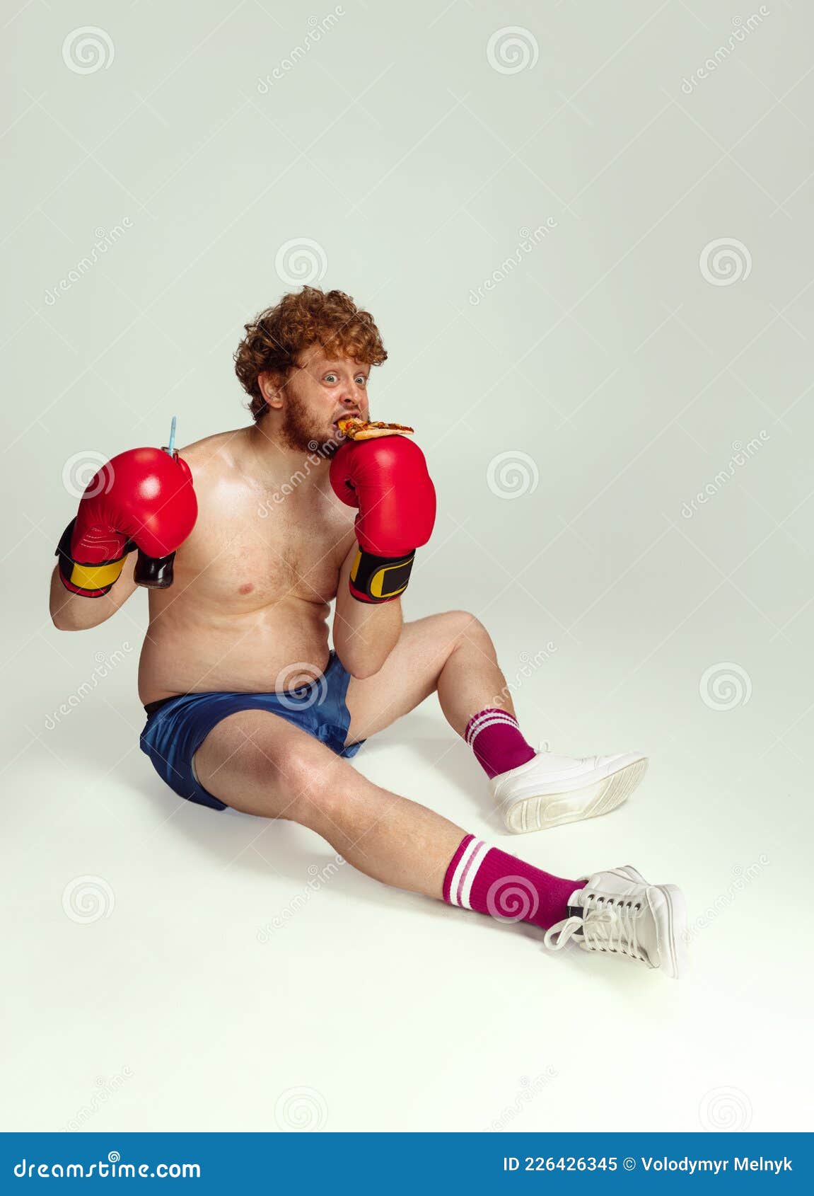 Funny Red-headed Man in Blue Boxing Shorts and Gloves Isolated on Gray  Studio Background. Concept of Sport, Humor and Stock Image - Image of  emotion, lifestyle: 226426345