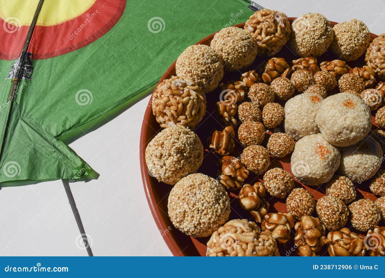 tasty assorted sankranti sweets. til laddu, peanut, amaranth, sesame, puffed rice ladoos indian sweet balls for uttarayan,pongal,