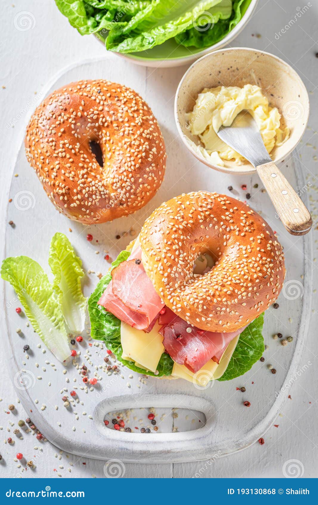 Tasty Bagel with Prosciutto and Cheese for Fresh Breakfast Stock Photo