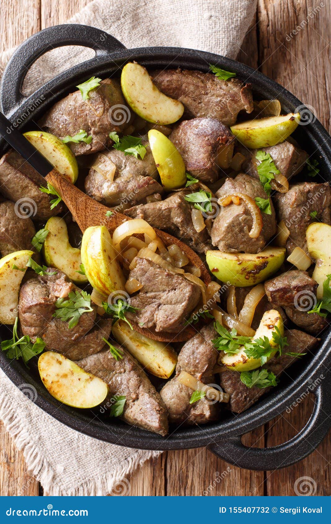 Tasty Beef Liver with Green Apples and Caramelized Onions Close-up in a ...