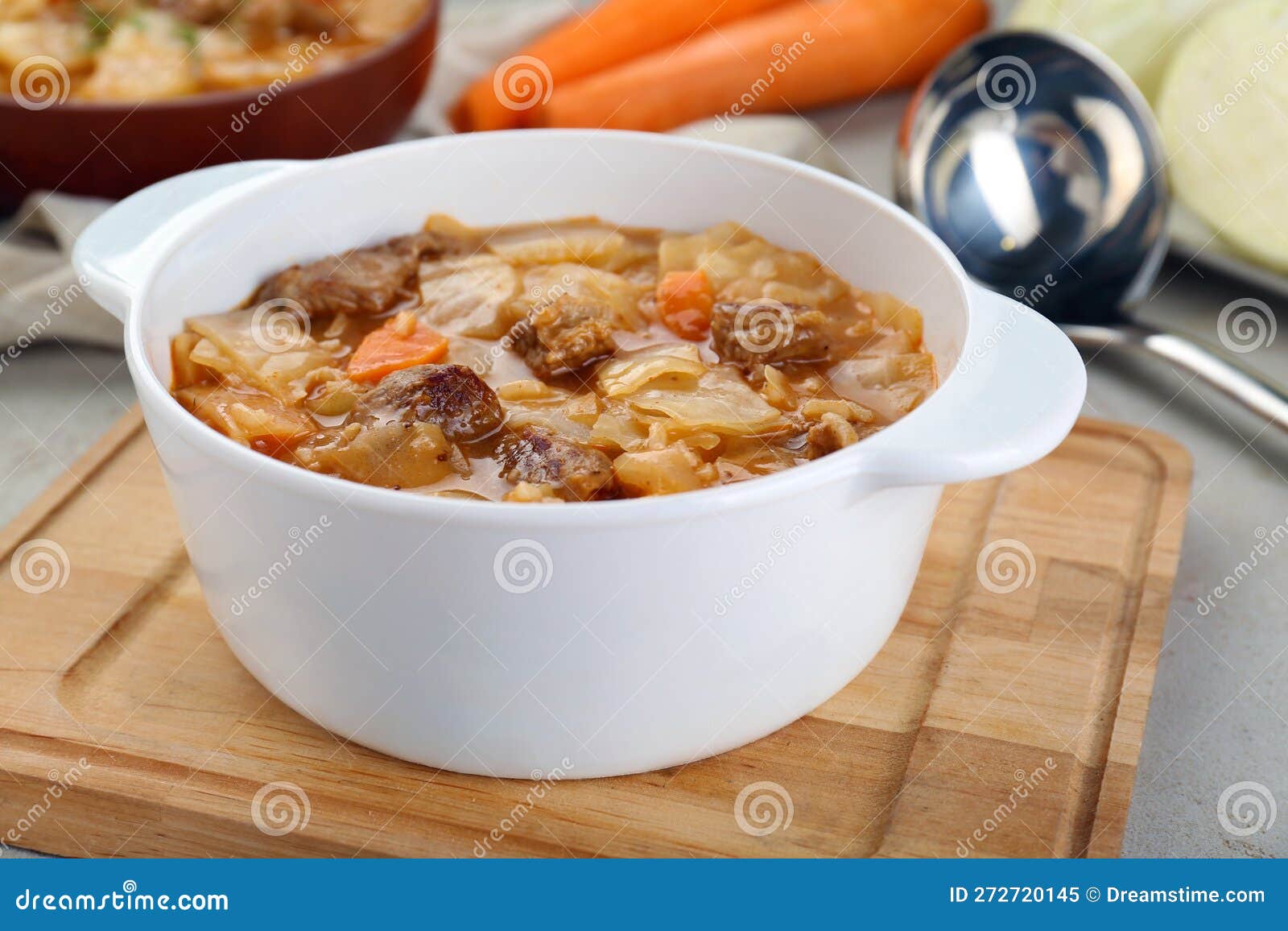 Tasty Cabbage Soup with Meat and Carrot on Table, Closeup Stock Image