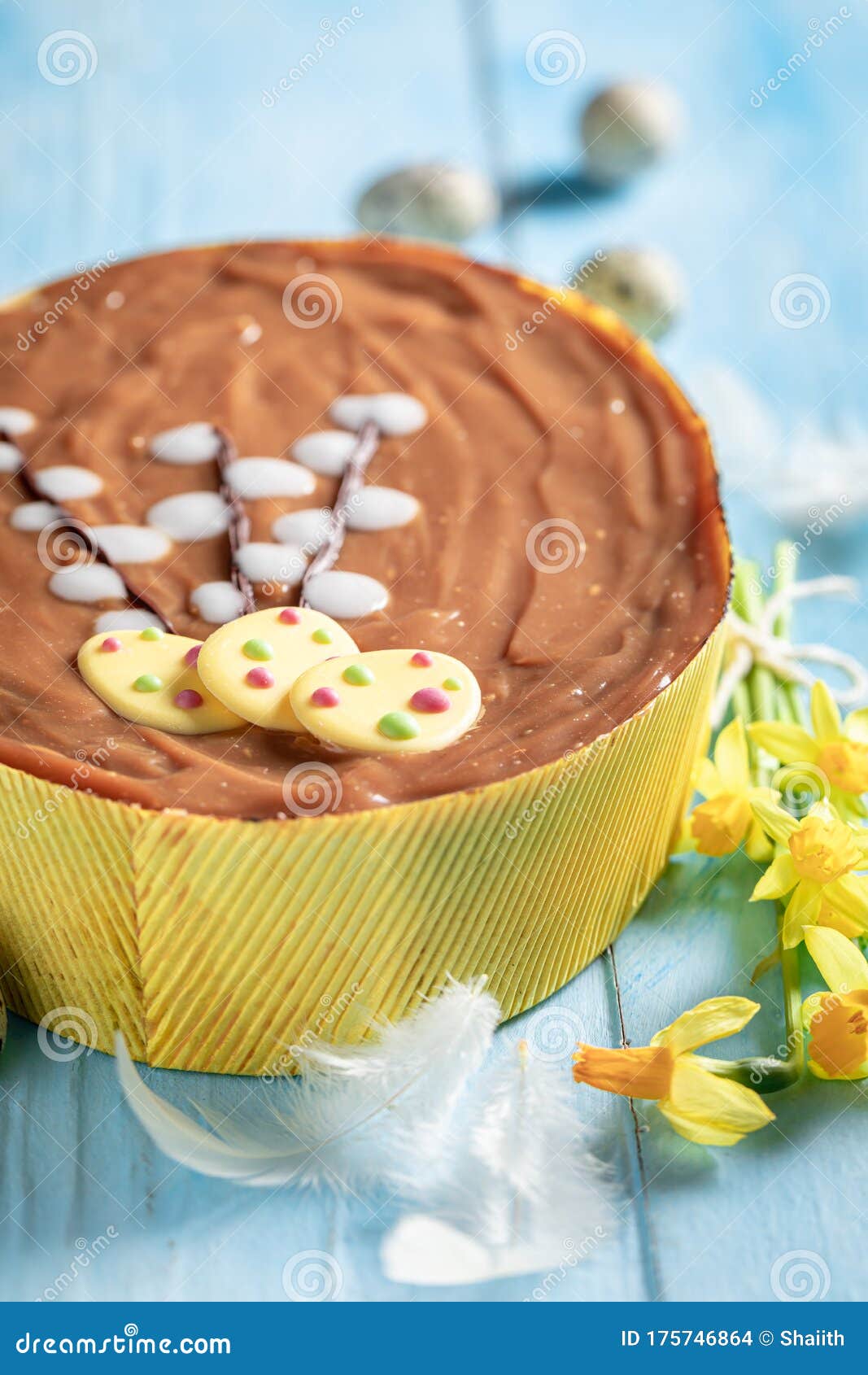 Tasty Cake for Easter Decorated with Yellow Daffodils Stock Photo