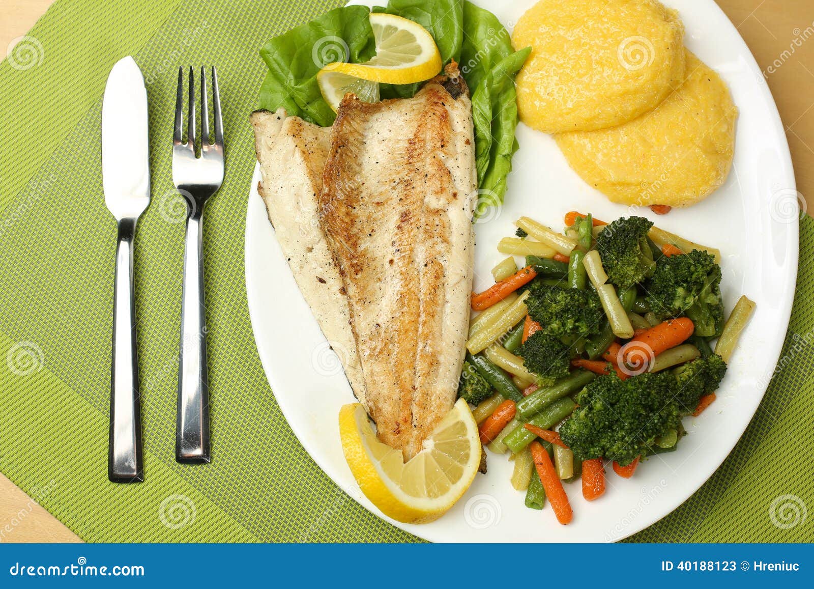 Tasty Fish with Lemon and Vegetables Stock Image - Image of green, fish ...