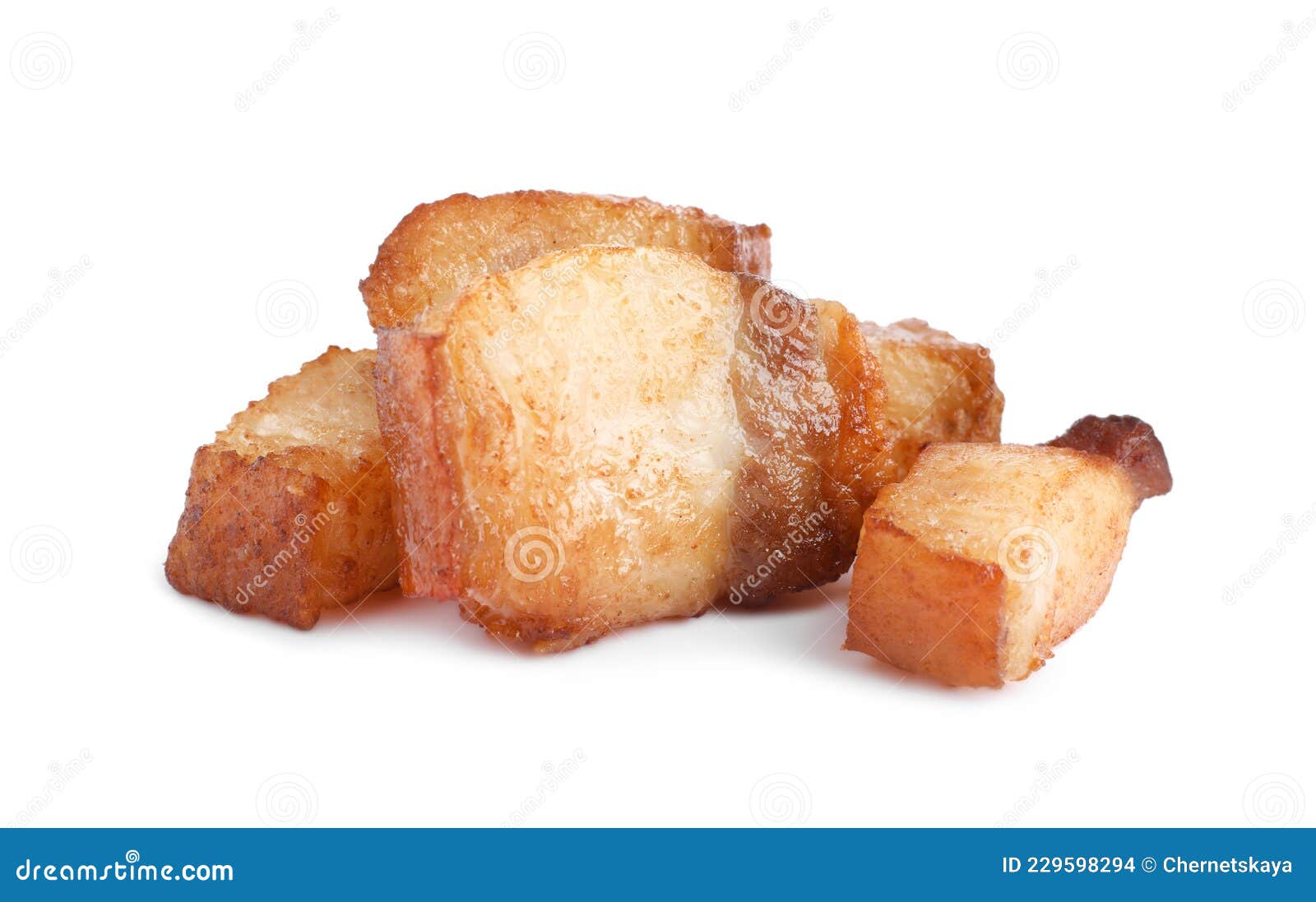 Tasty Fried Cracklings on White Background. Cooked Pork Lard Stock