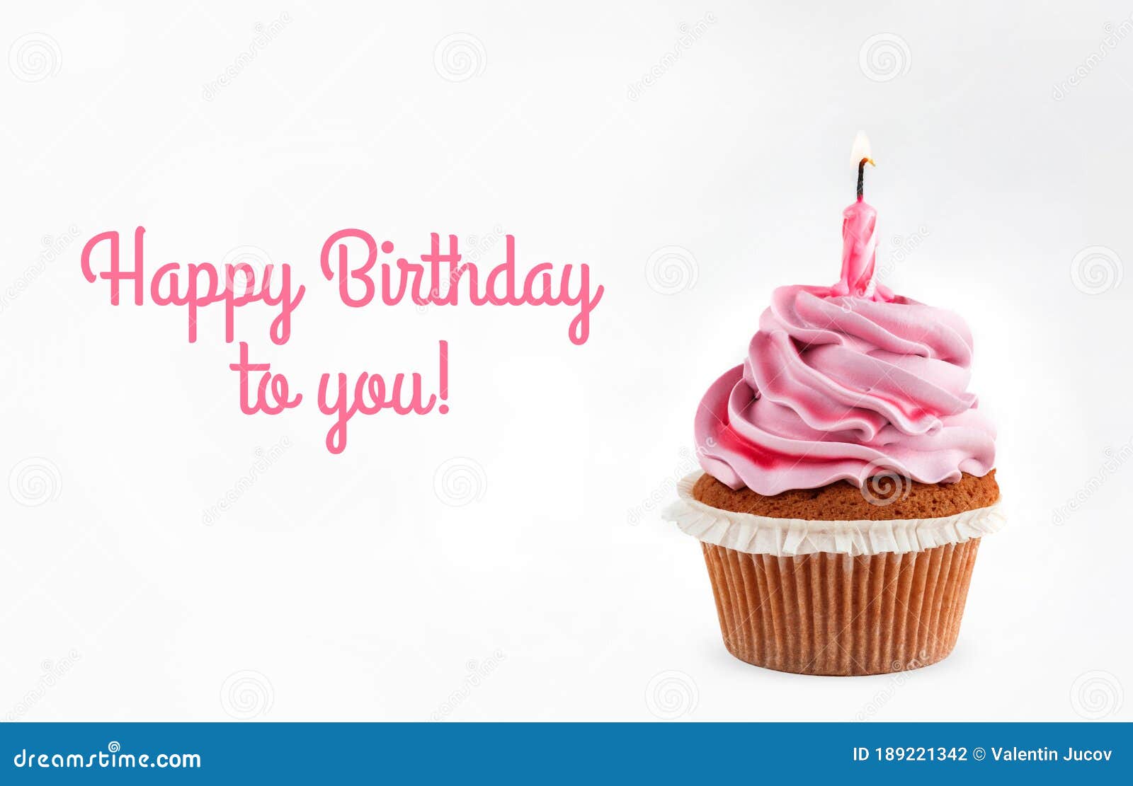 Tasty pink cupcake with candle on white background with text Happy Birthday to you. Holiday cake celebration, close up