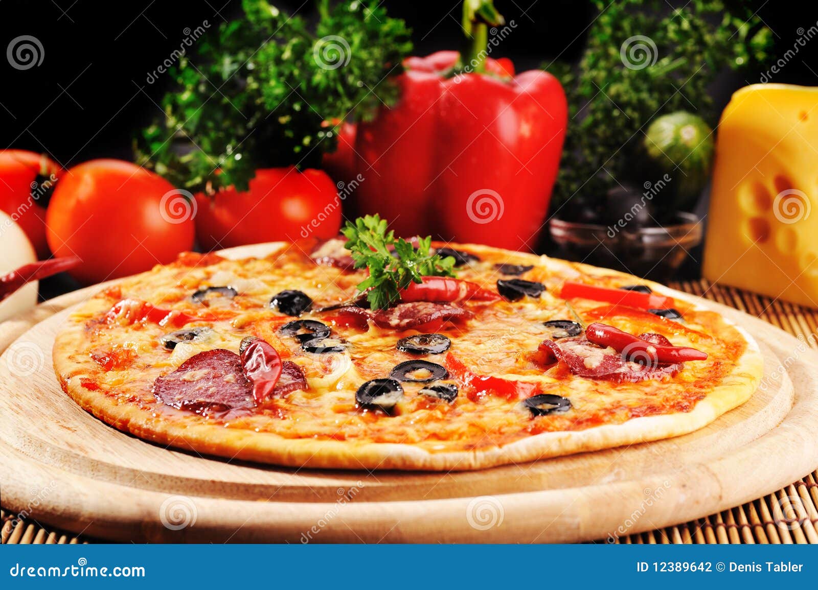 Tasty pizza on plate stock photo. Image of gourmet, edible 12389642