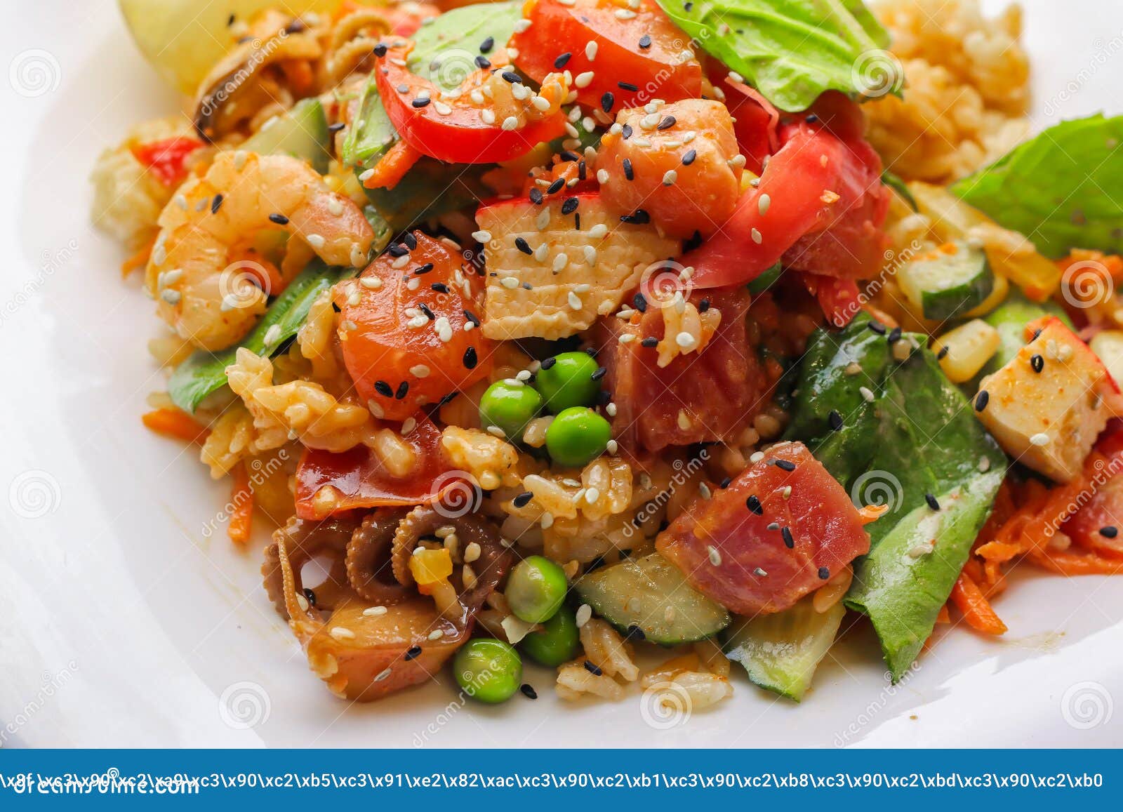 tasty poke bowl with seafood and vegetables