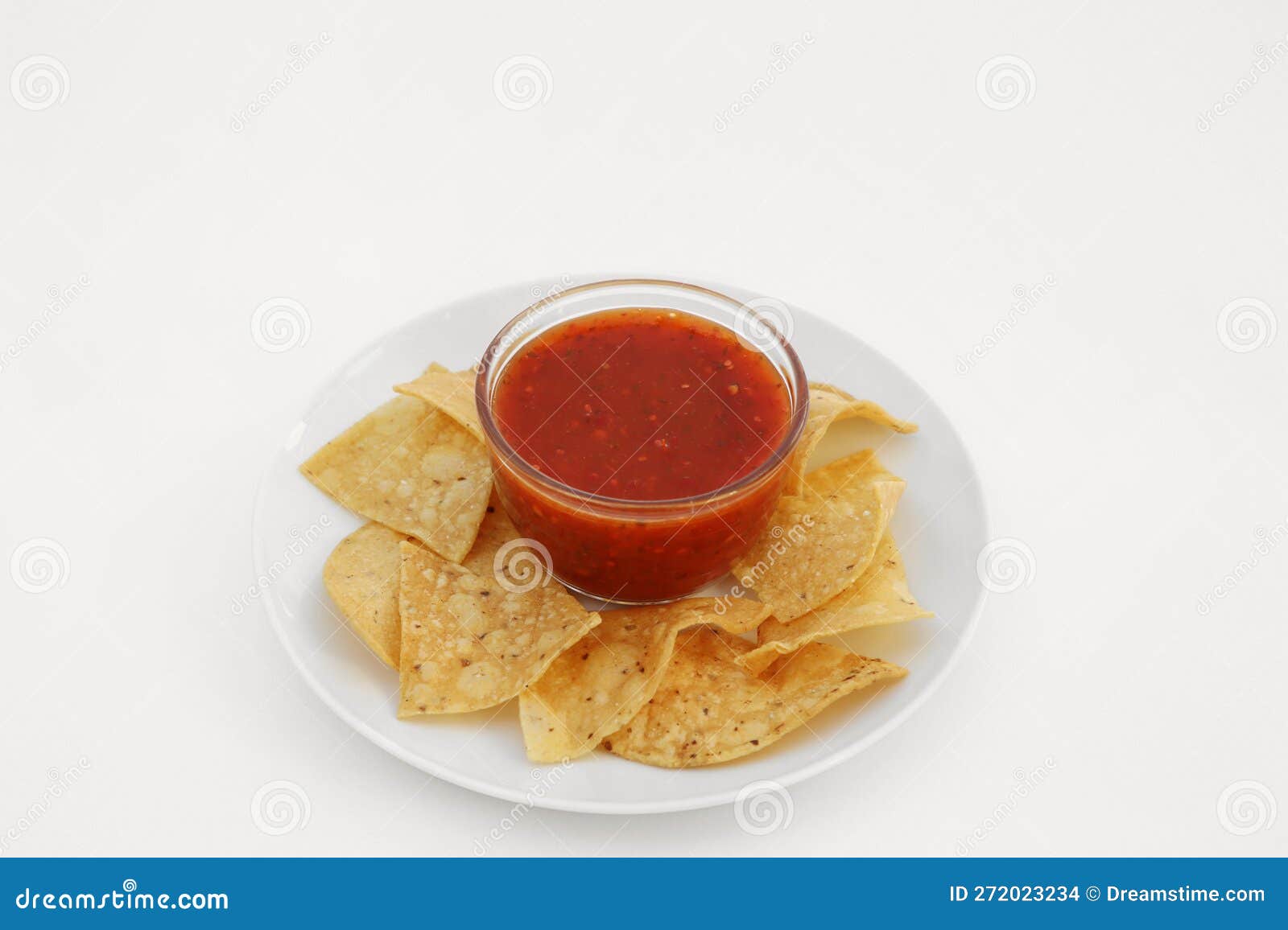 Tasty Salsa Sauce and Tortilla Chips on White Background Stock Photo