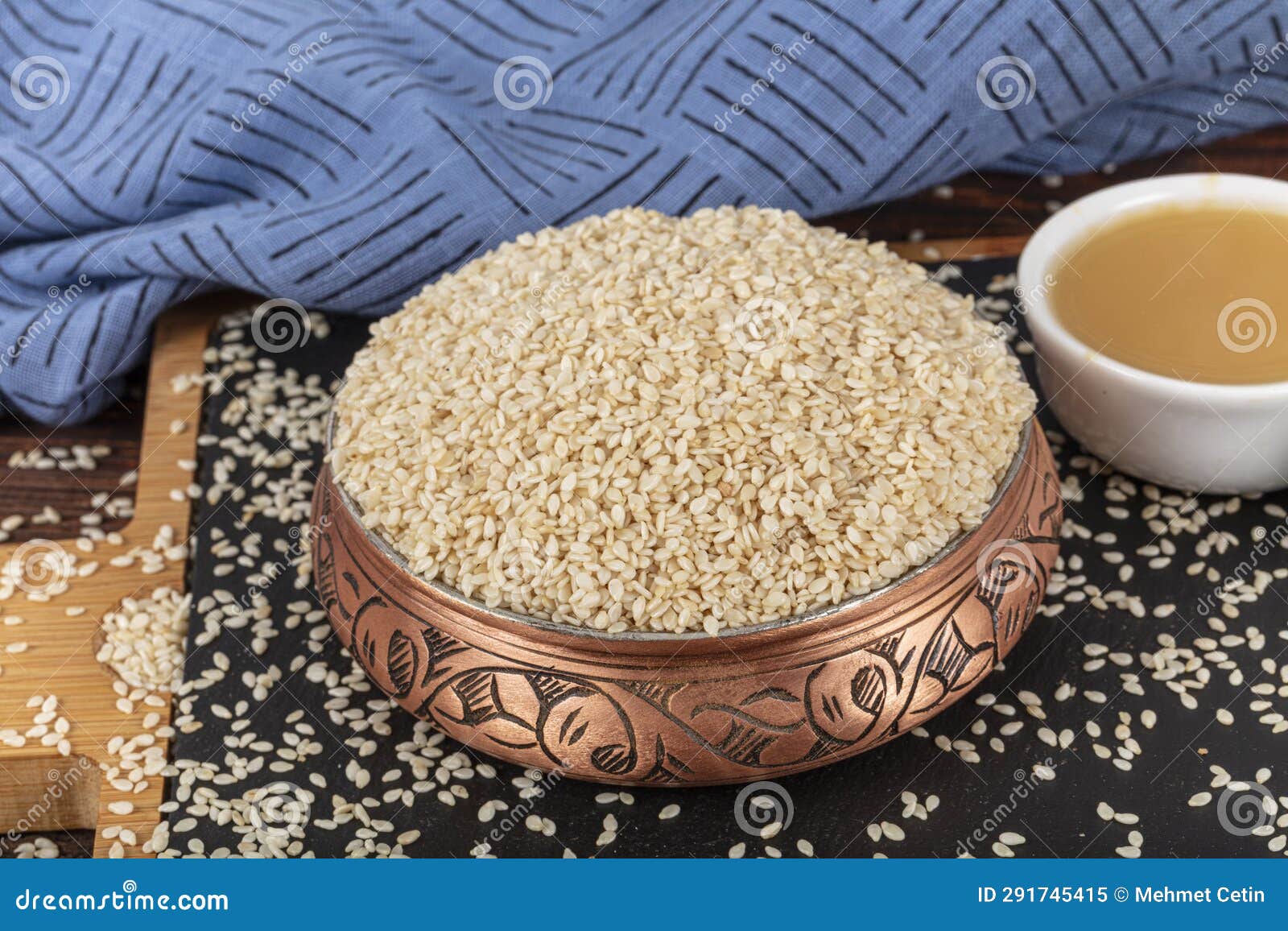 Tasty Sesame Paste and Seeds. Closeup of Lots of White Sesame Seeds