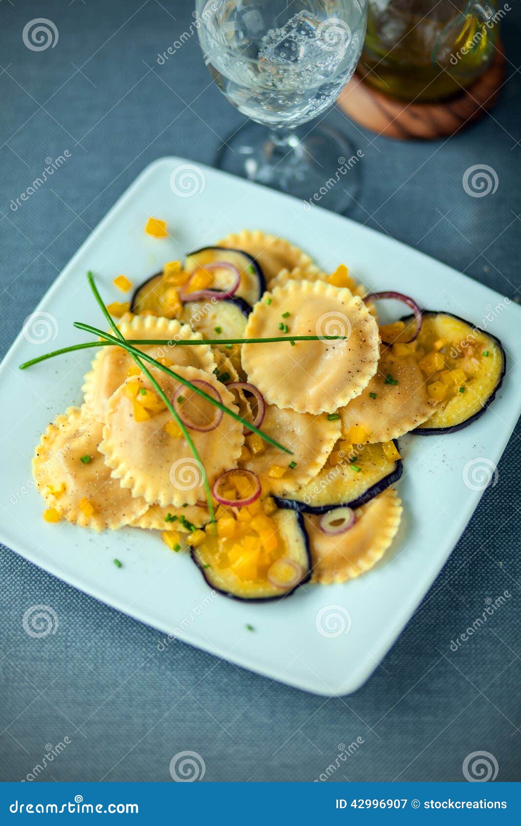tasty vegetarian cuisine with ravioli and eggplant