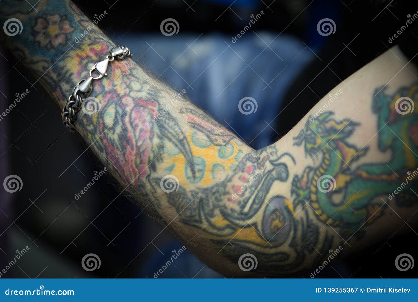 Premium Photo | A man with a tattoo on his arm