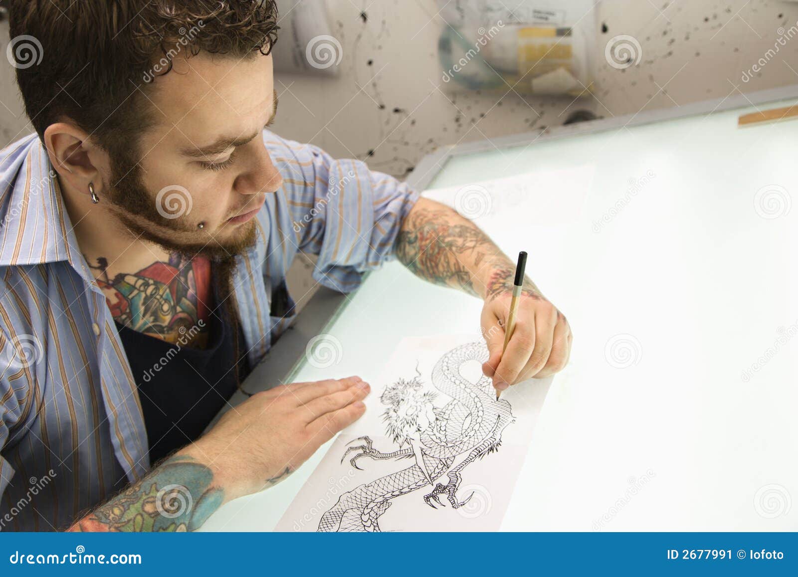 tattoo artist.