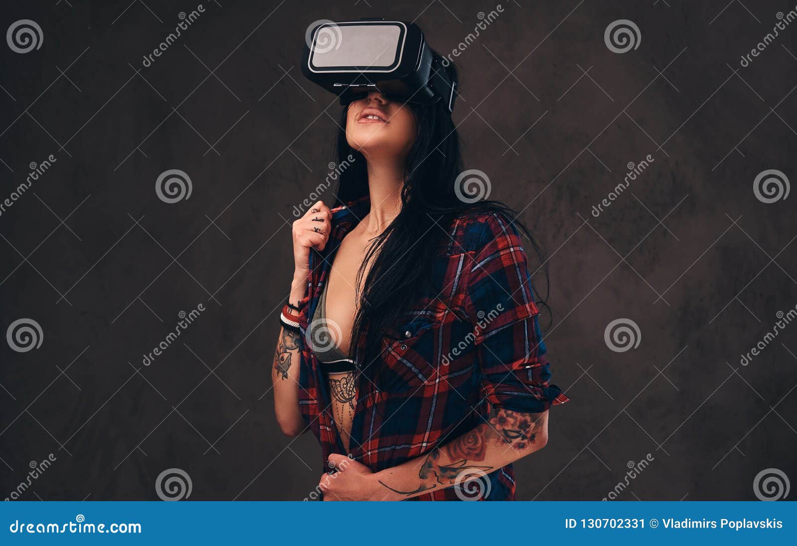 Tattooed Girl Wearing A Red Unbuttoned Checked Shirt Wearing A Vr Headset Stock Image Image