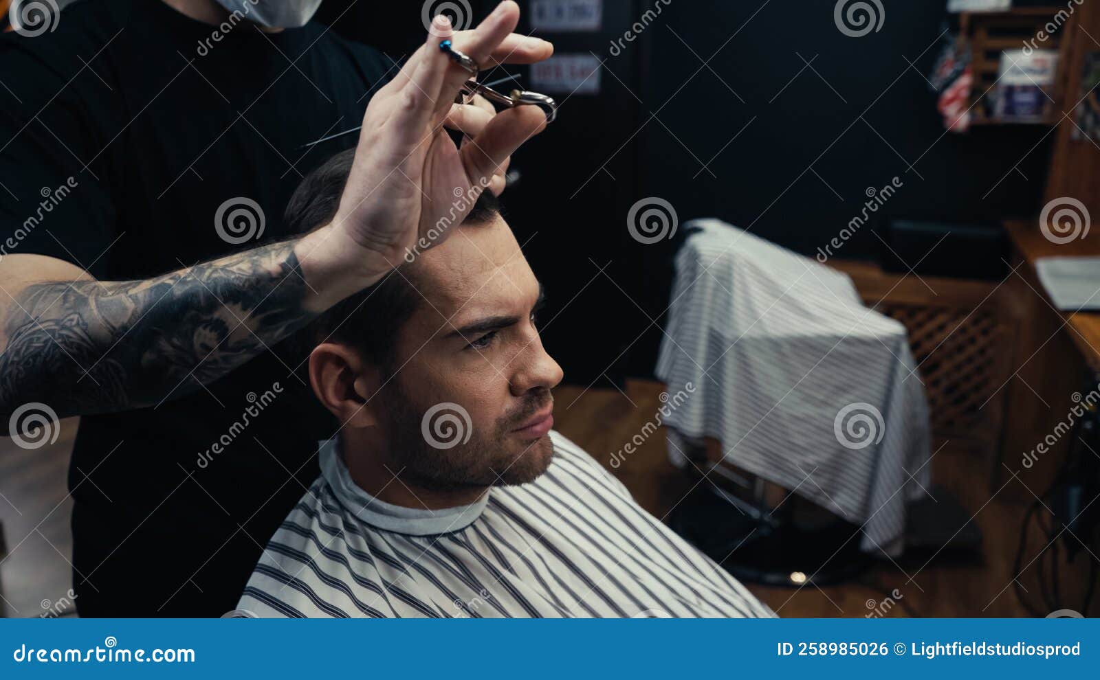 Hairstylist with blue hair and tattooed sleeve - wide 7