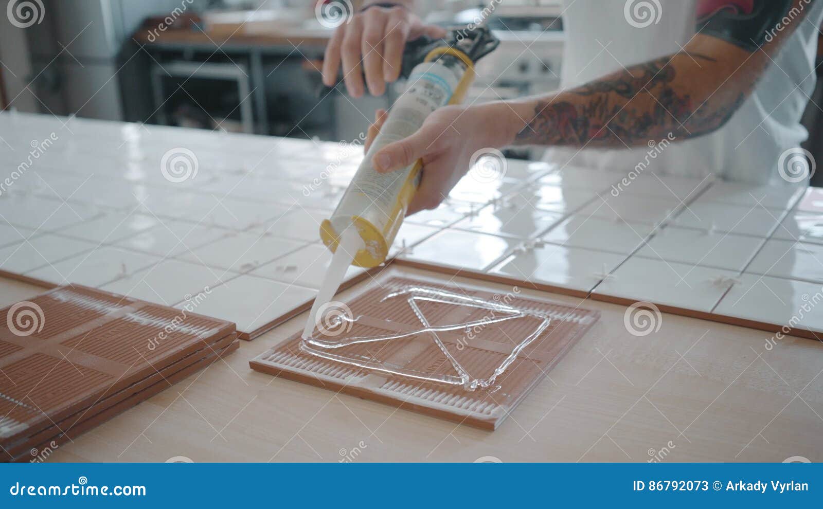 Tattooed Man Applies Ceramic Tiles On Kitchen Table Set Stock Video Video Of Contractor