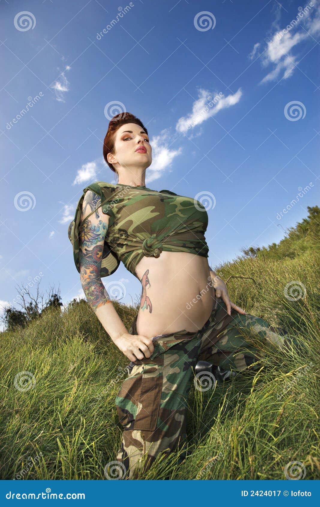 Tattooed Woman In Camouflage Royalty Free Stock