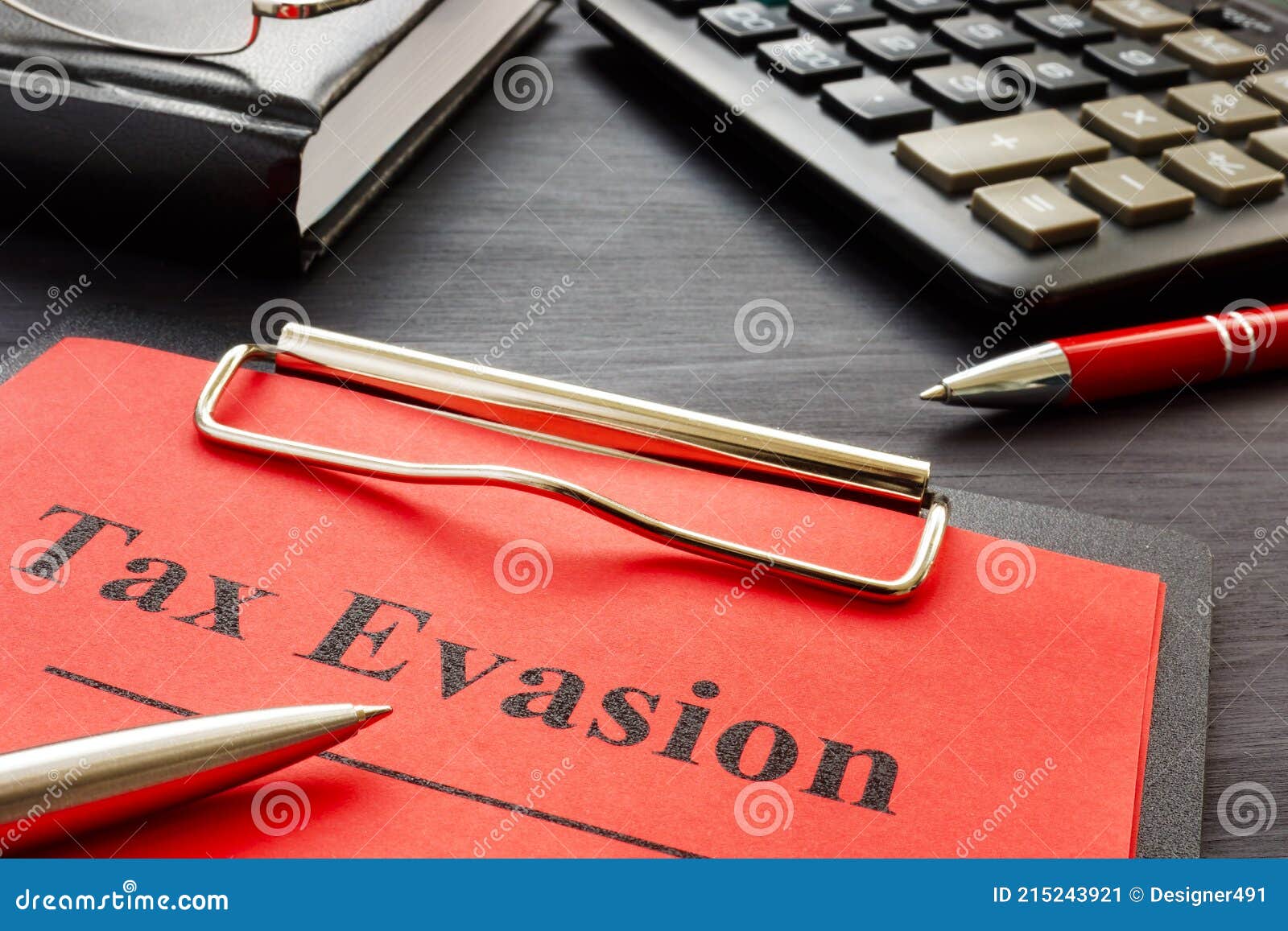 tax evasion result of audit with clipboard.