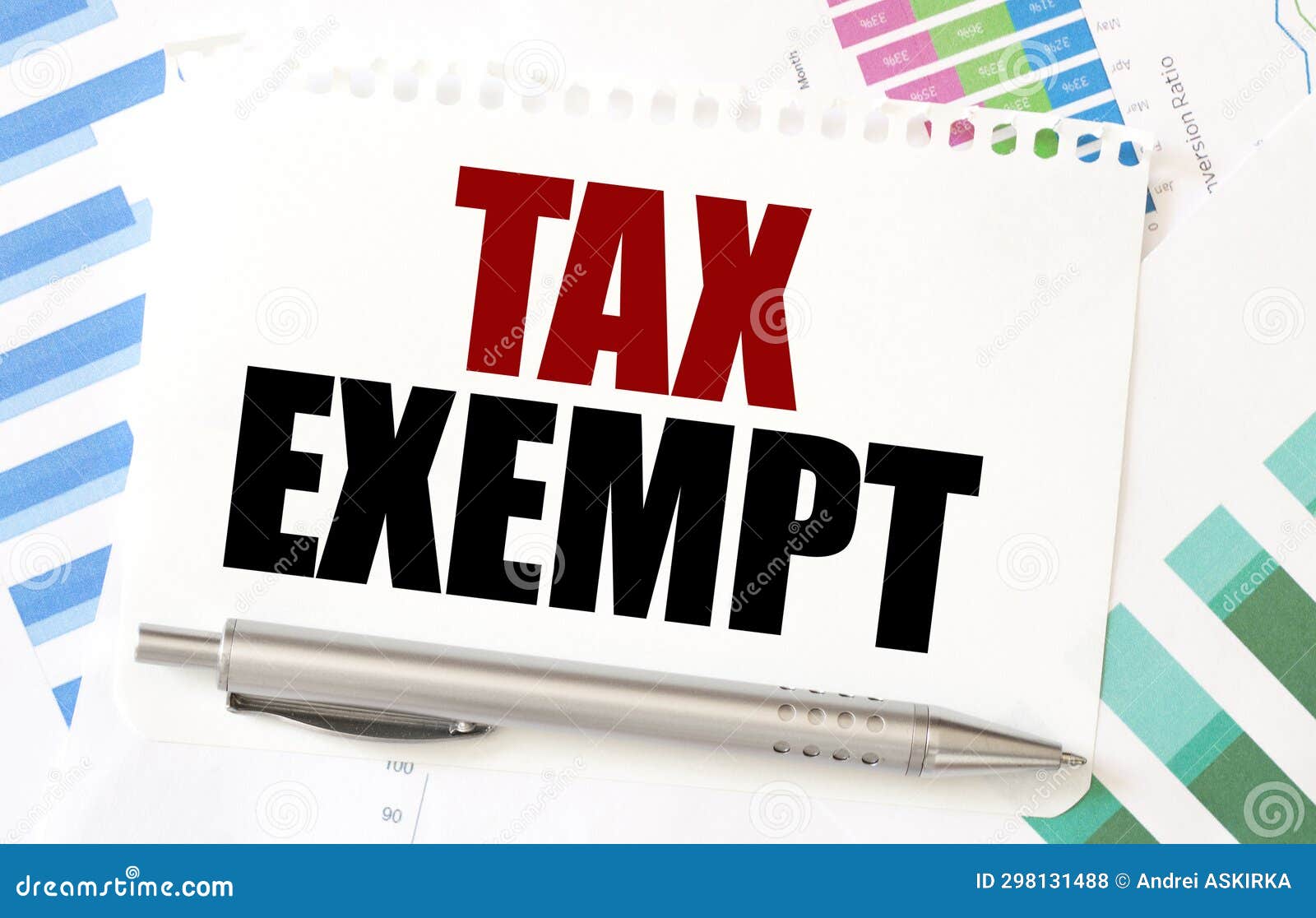TAX EXEMPT on Paper with Charts and Pen Stock Photo Image of letter
