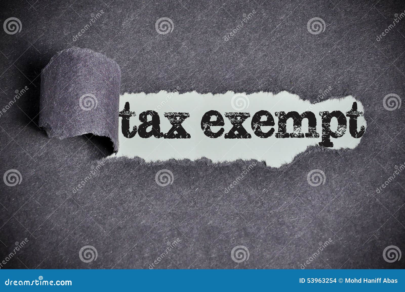 tax exempt word under torn black sugar paper