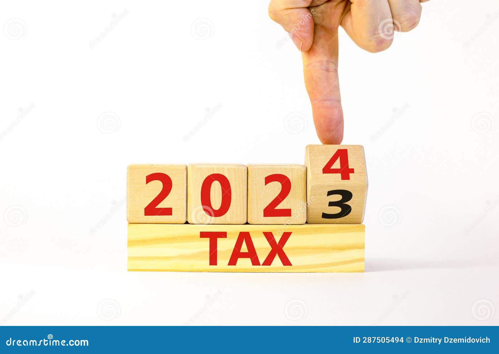 2024 Tax New Year Symbol. Businessman Turns a Wooden Cube and Changes