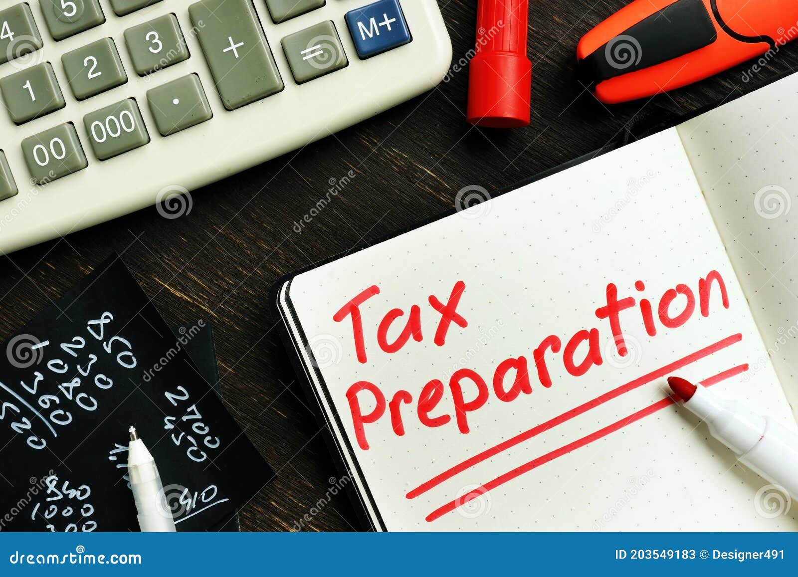 tax preparation memo on the page of notepad.