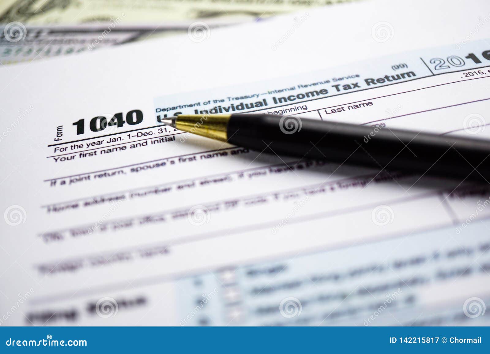 tax-return-form-1040-and-dollar-banknote-editorial-photography-image