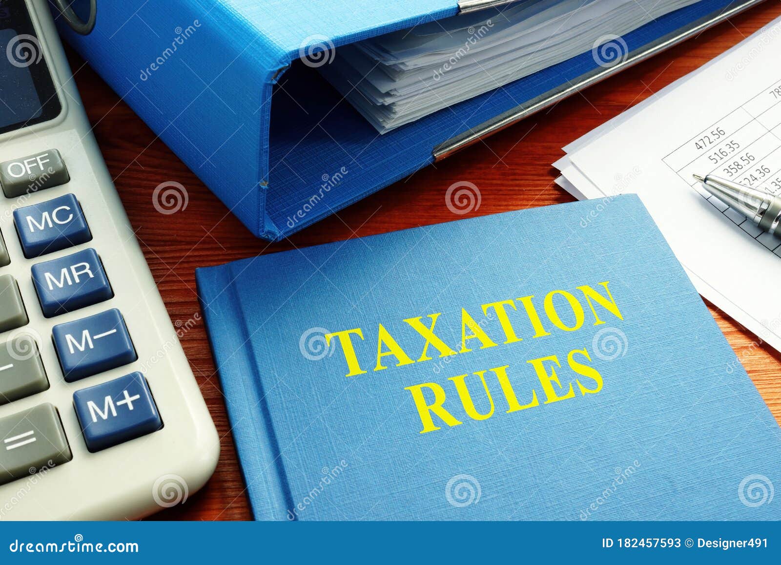 Taxation Rules Book with Documents and Calculator Stock Image Image