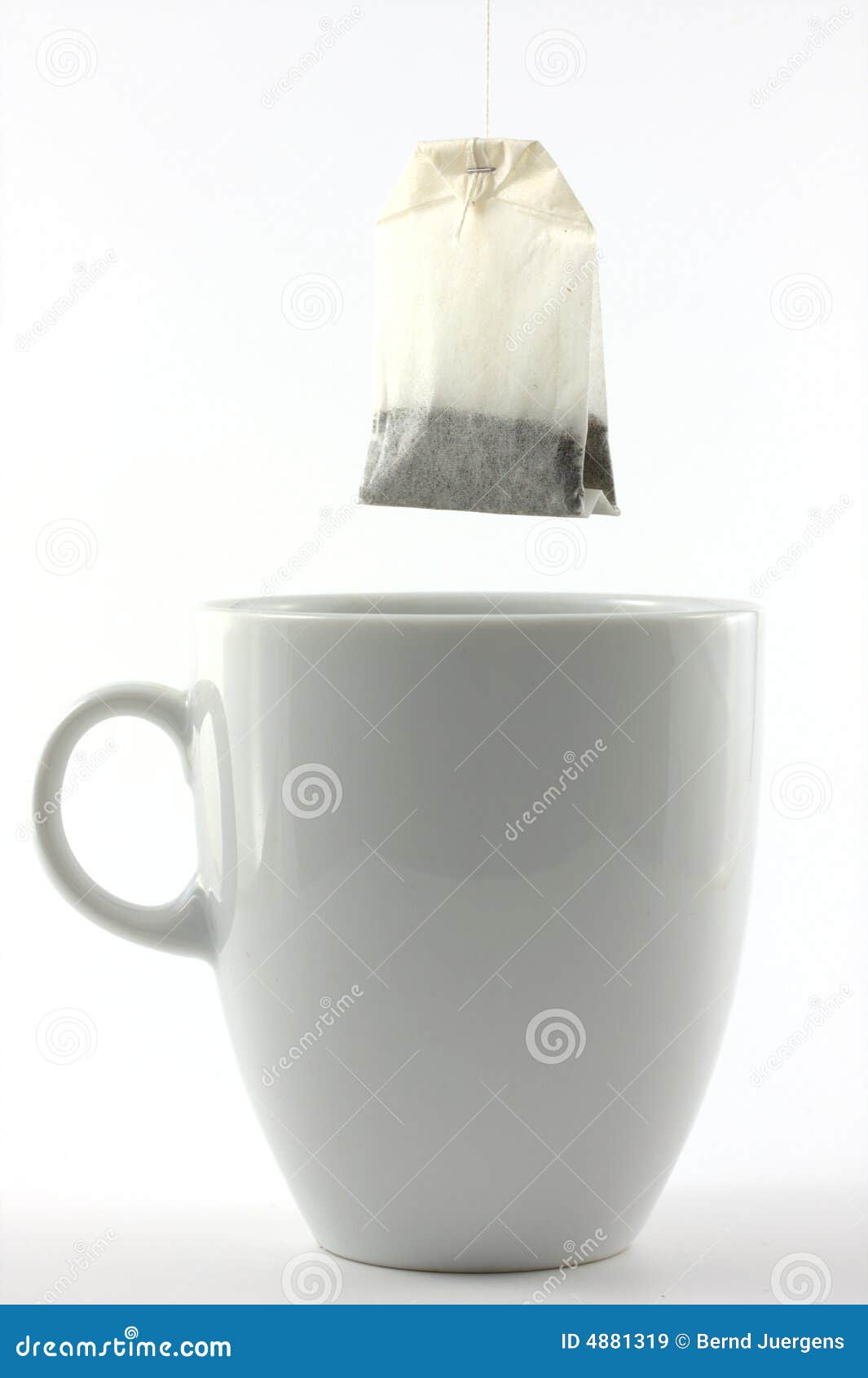 Tea bag and a white mug stock image. Image of decoration 4881319