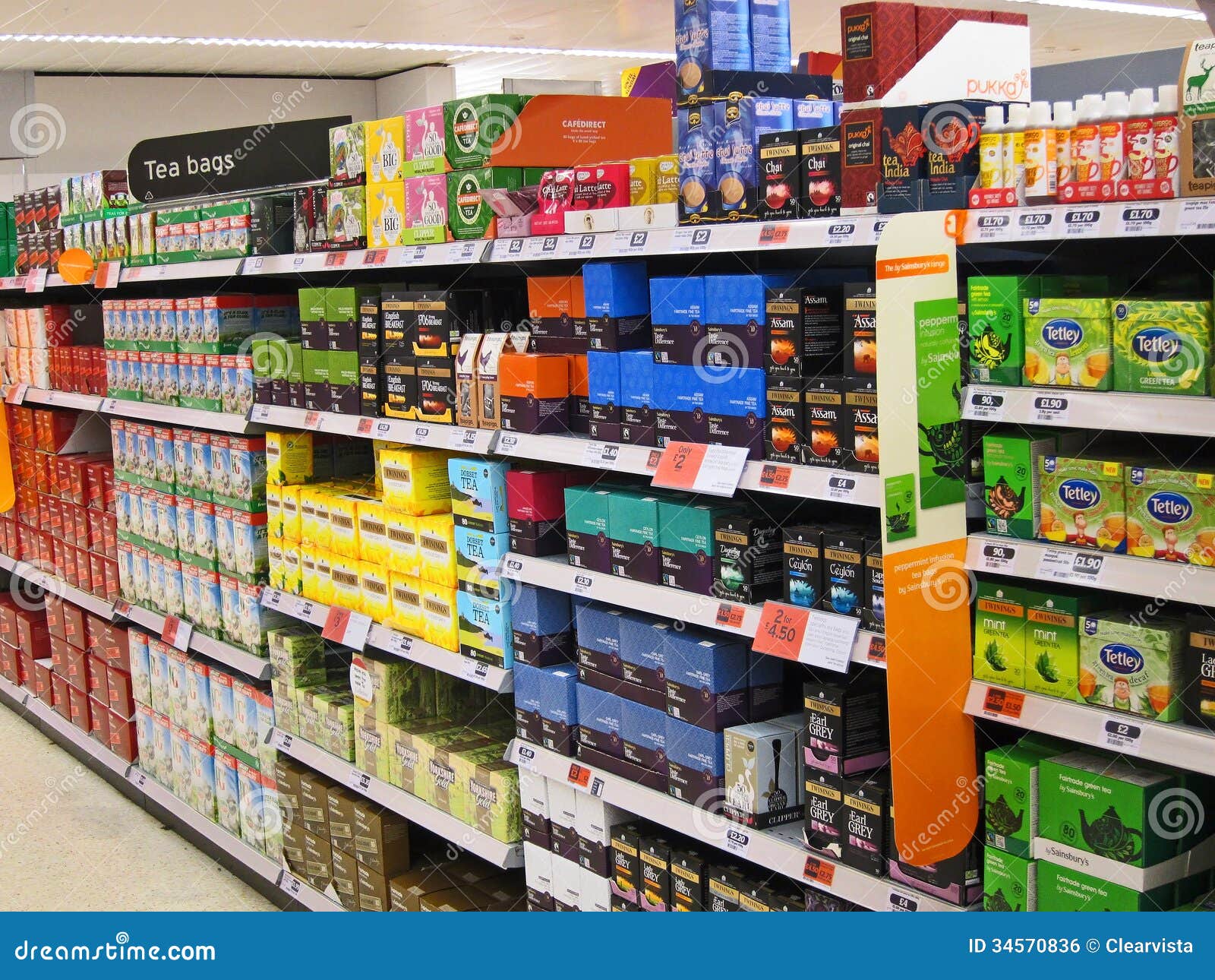 Various packets of tea bags for sale on the shelves of a superstore 