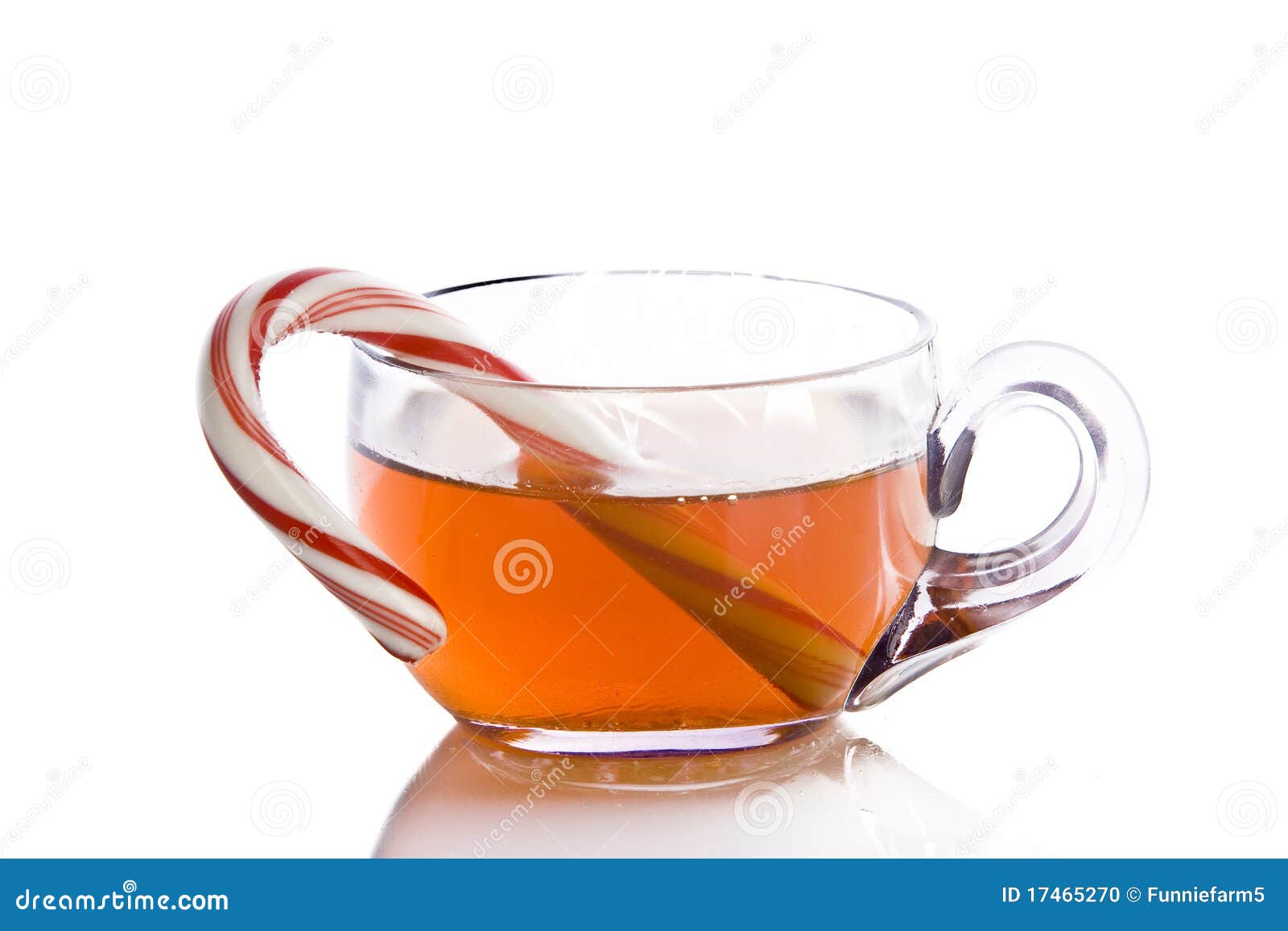 Tea with a candy cane stock photo. Image of confection 17465270