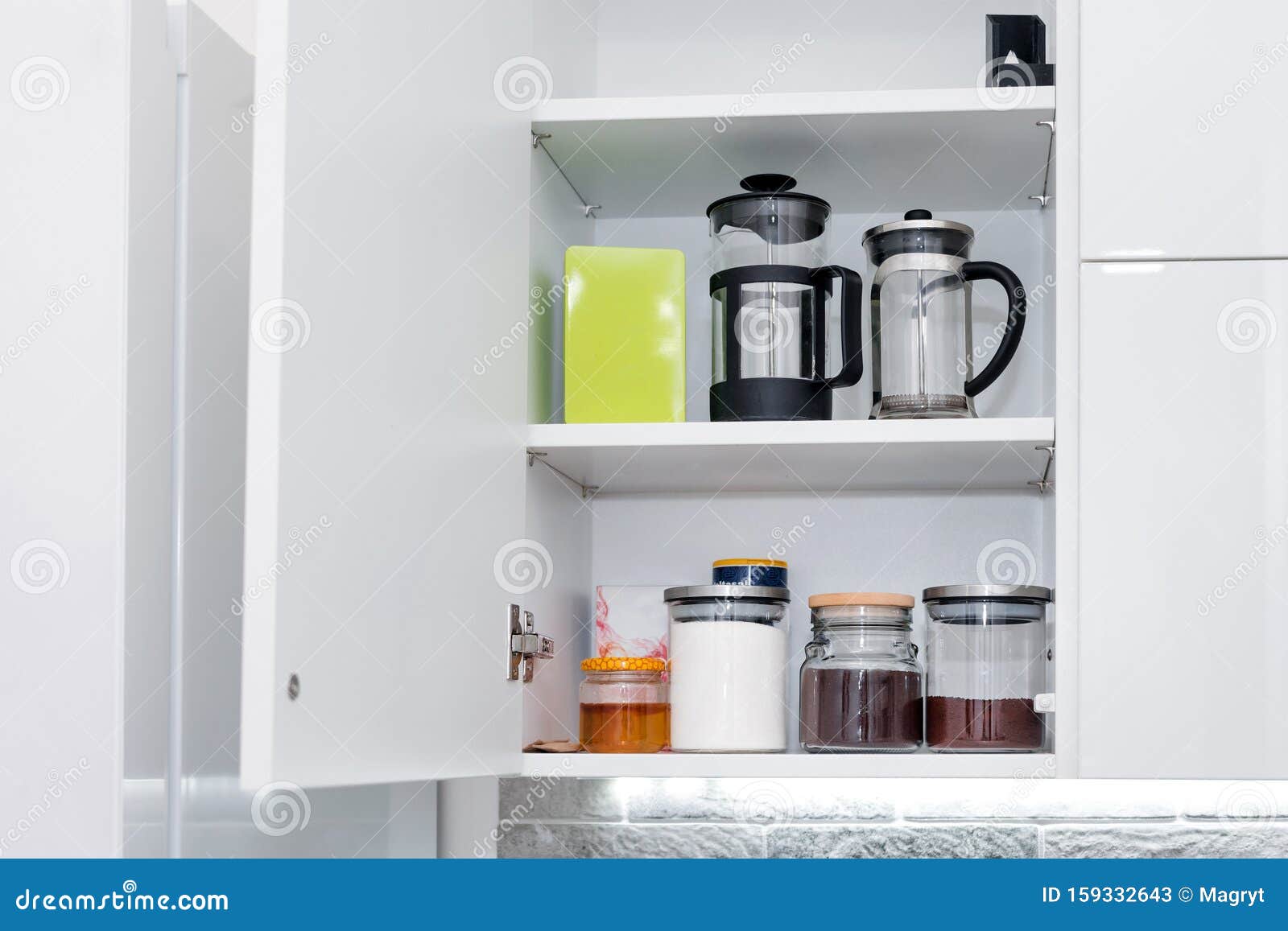 Tea, Coffee and Sugar on a Shelf in the Kitchen Stock Image