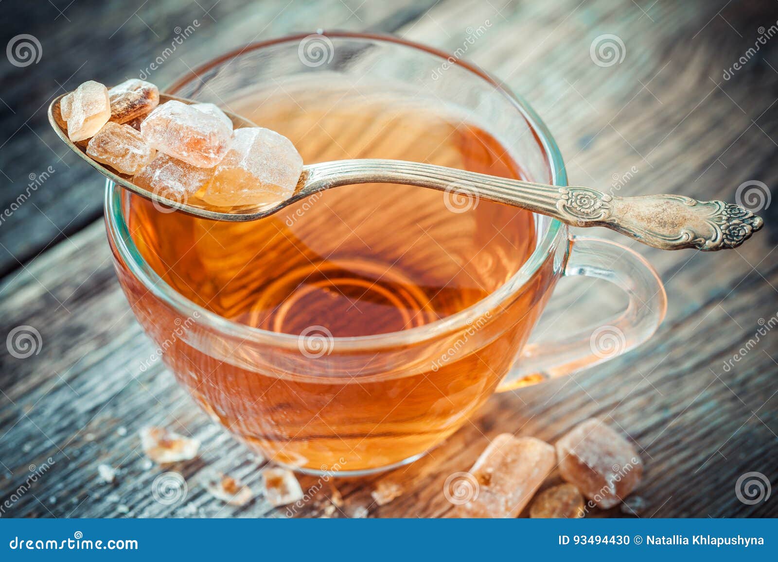 Tea Cup and Caramelized Cane Sugar in Spoon. Stock Photo Image of