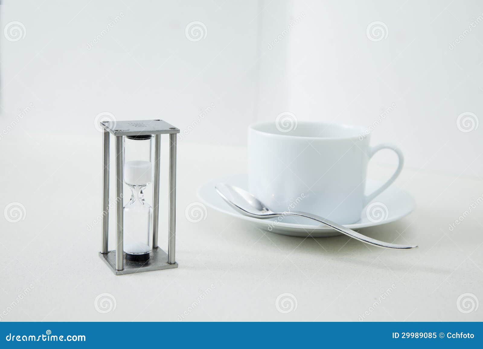 Tea cup and hourglass stock image. Image of drink, western 29989085