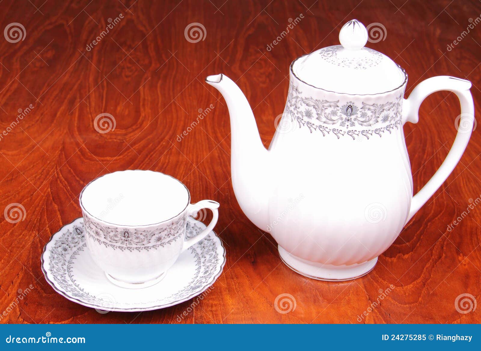 Tea cup and tea pot stock image. Image of motif, background 24275285