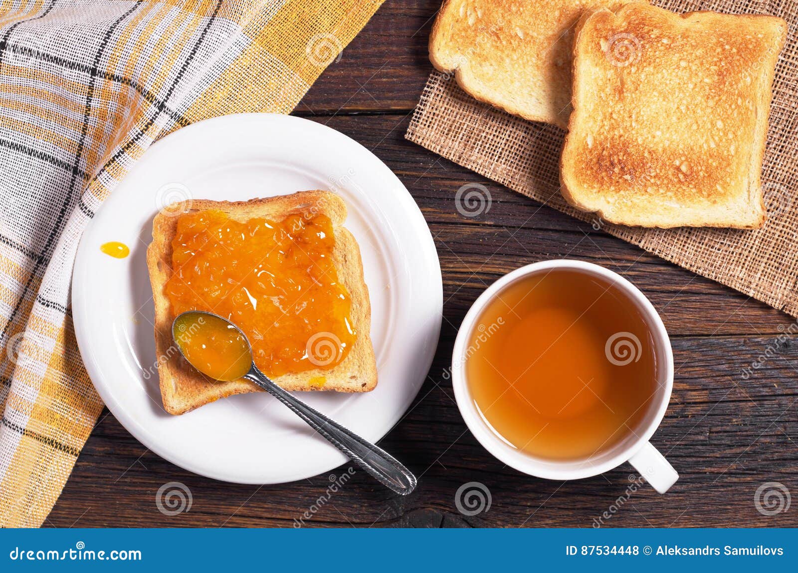 tea cup and toast with jam