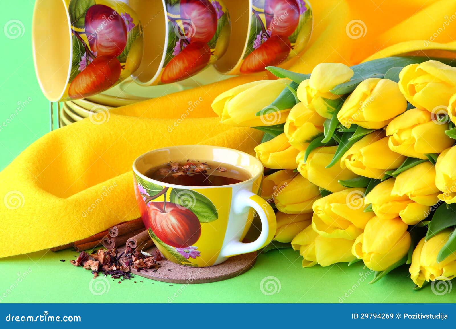 Tea cups and yellow tulips stock image. Image of blooming 29794269