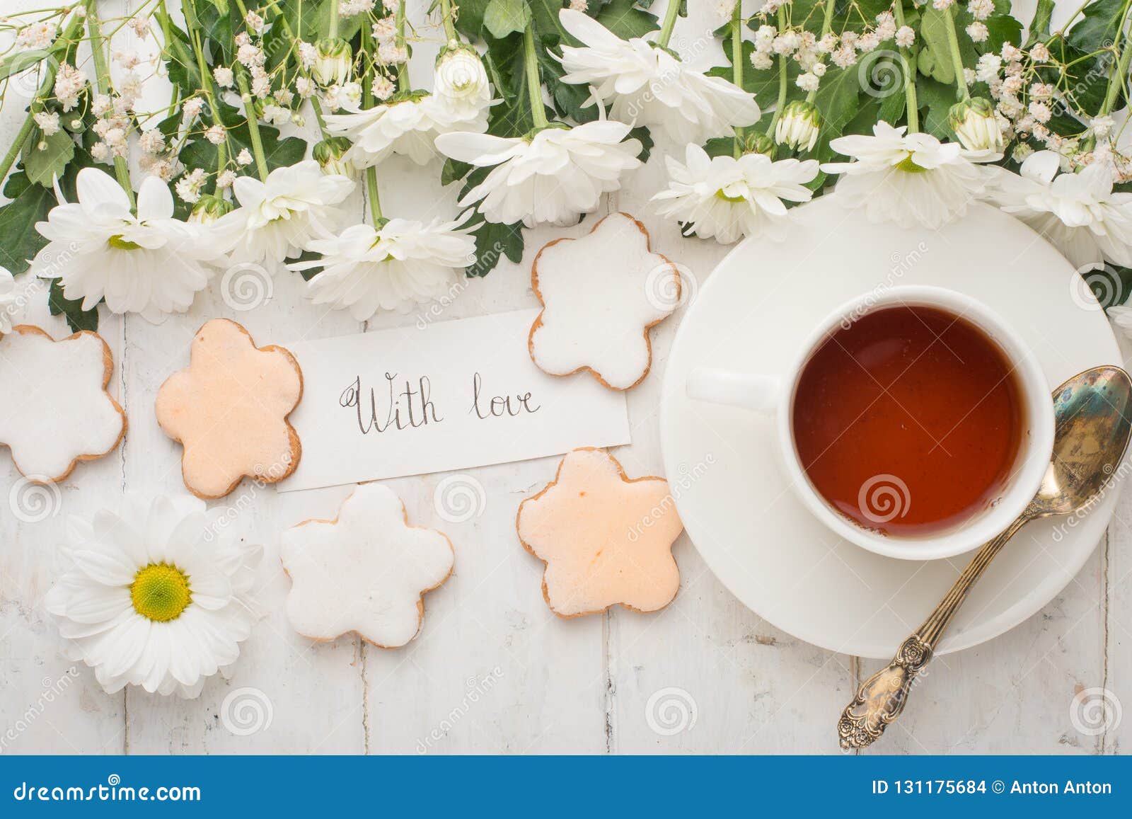 Tea with Flowers and Biscuits Made with Love. Top View with Empty Space