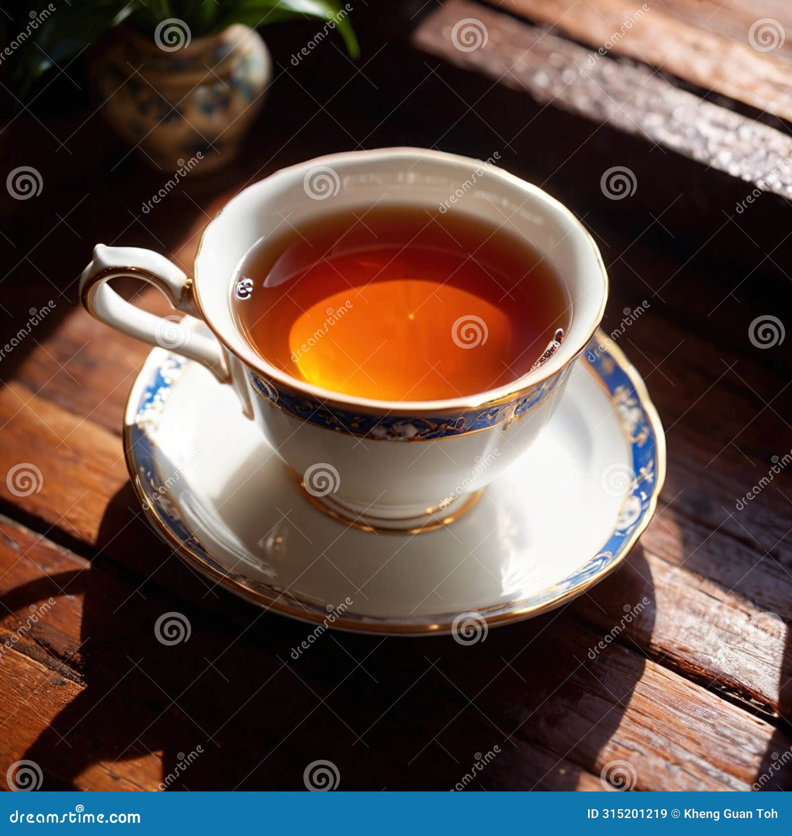 tea, fresh brewed black tea in cup with tea leaves