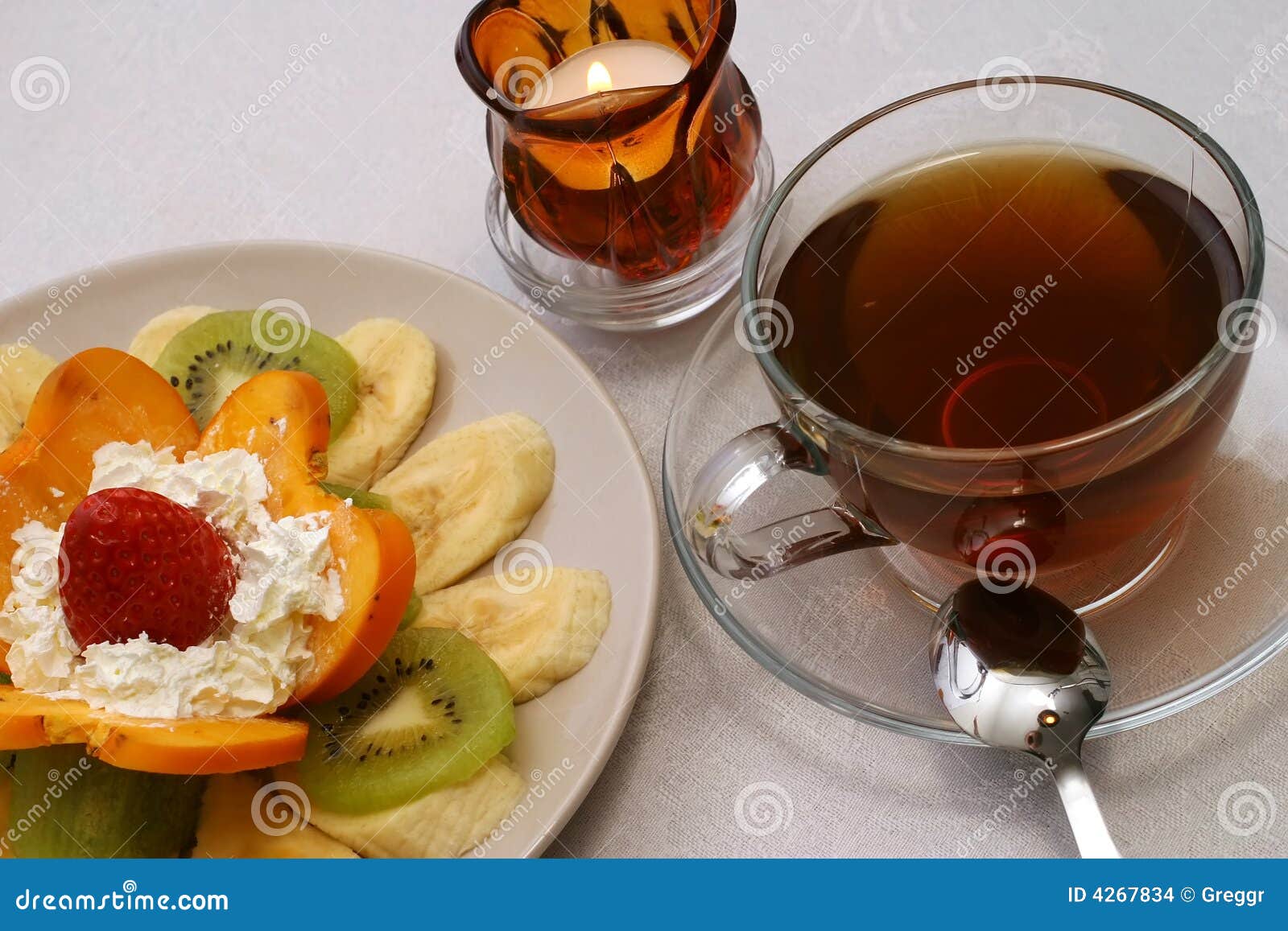Tea and fruit salad stock photo. Image of banan, green 4267834