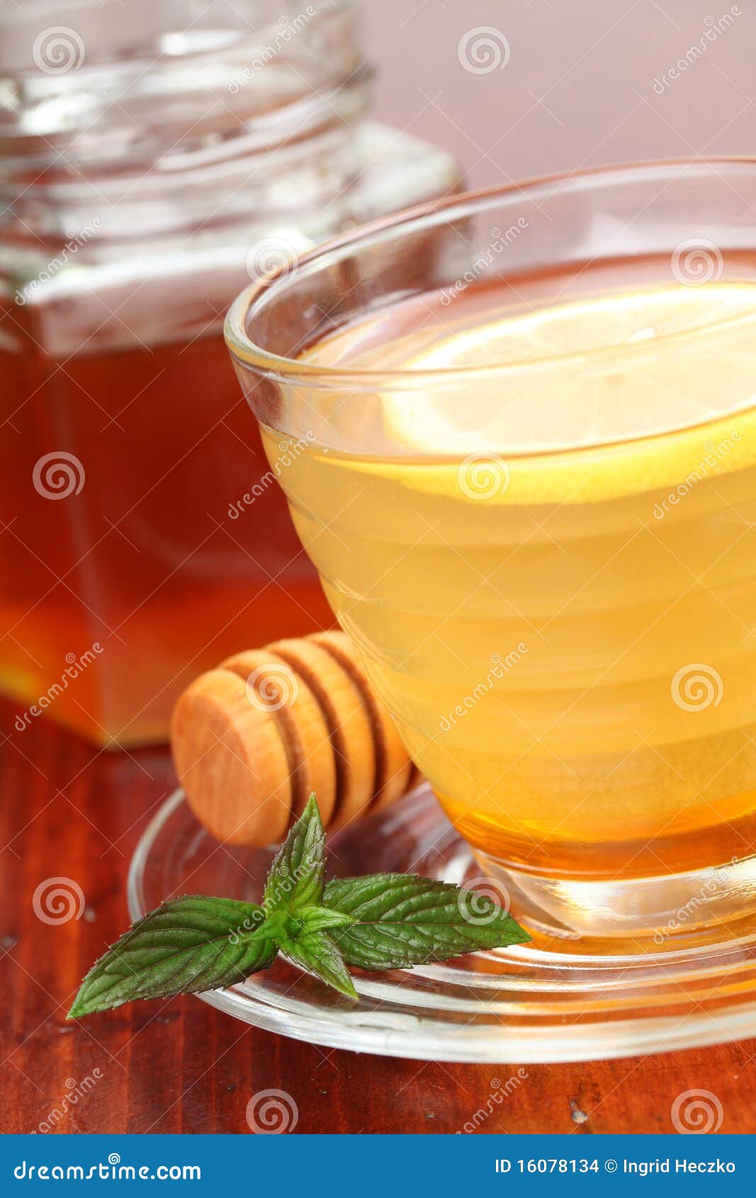 Tea with honey and lemon stock photo. Image of illness 16078134