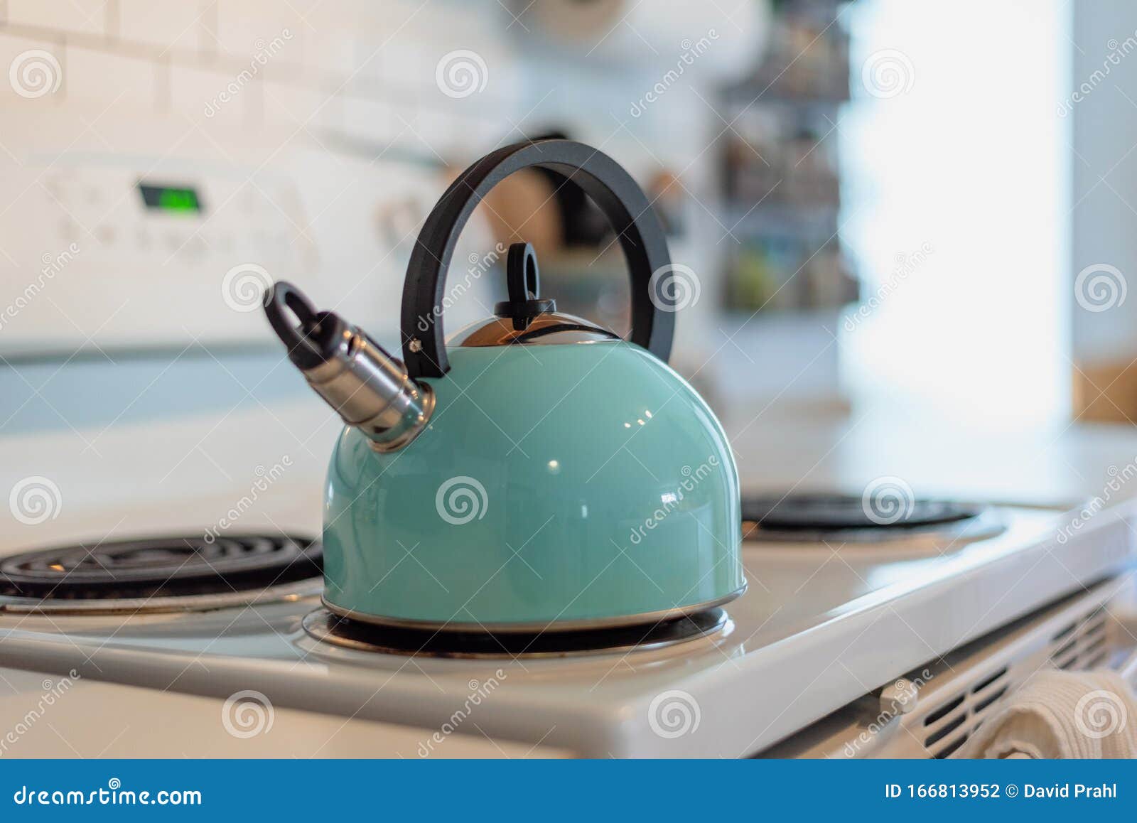 Tea Kettle Warming Up on Stove Top Stock Photo Image of beverages
