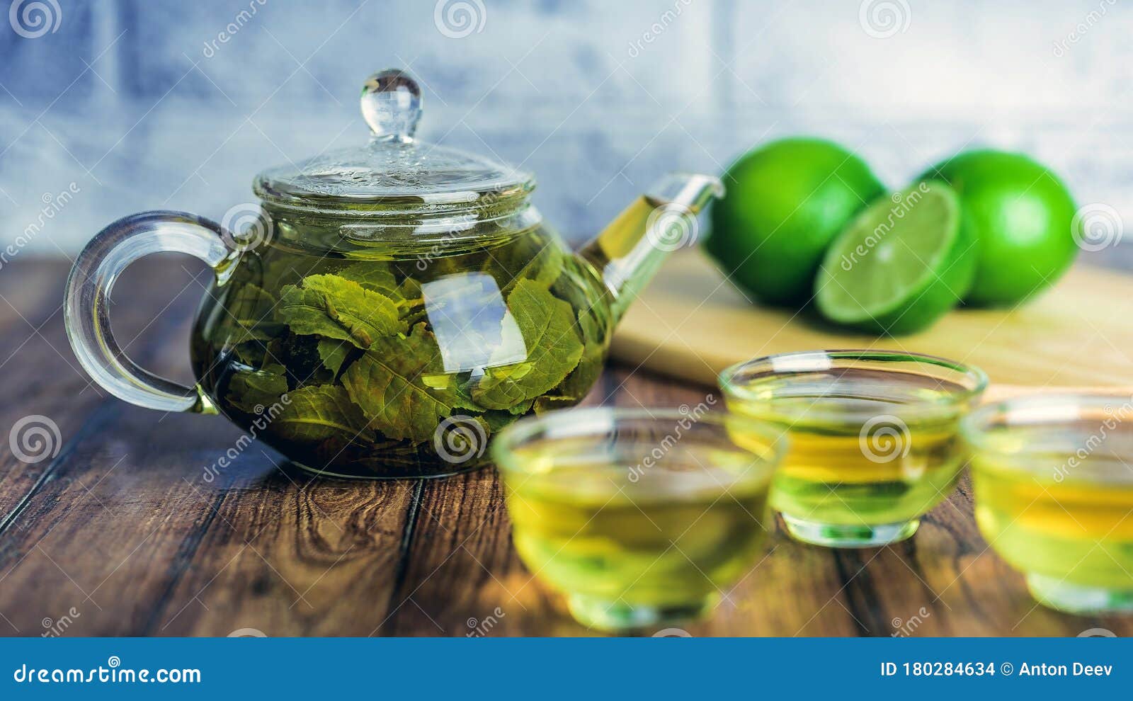 the tea leaves are brew in boiling water and infuse in a small teapot. the concept of the tea party. green tea in a