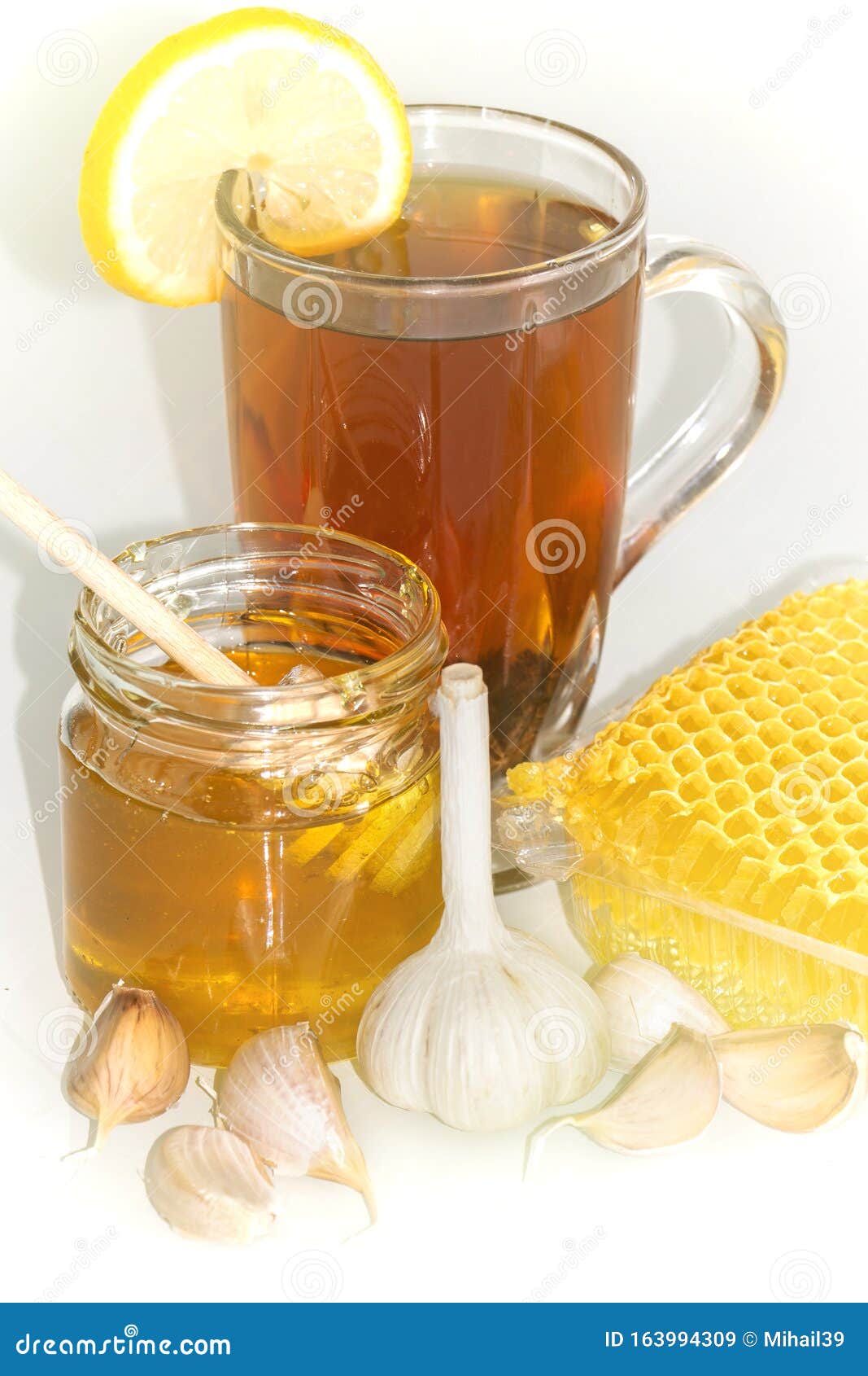 Tea with Lemon and Honey, Garlic Cloves. the Honey in the Comb. Stock Image Image of macro