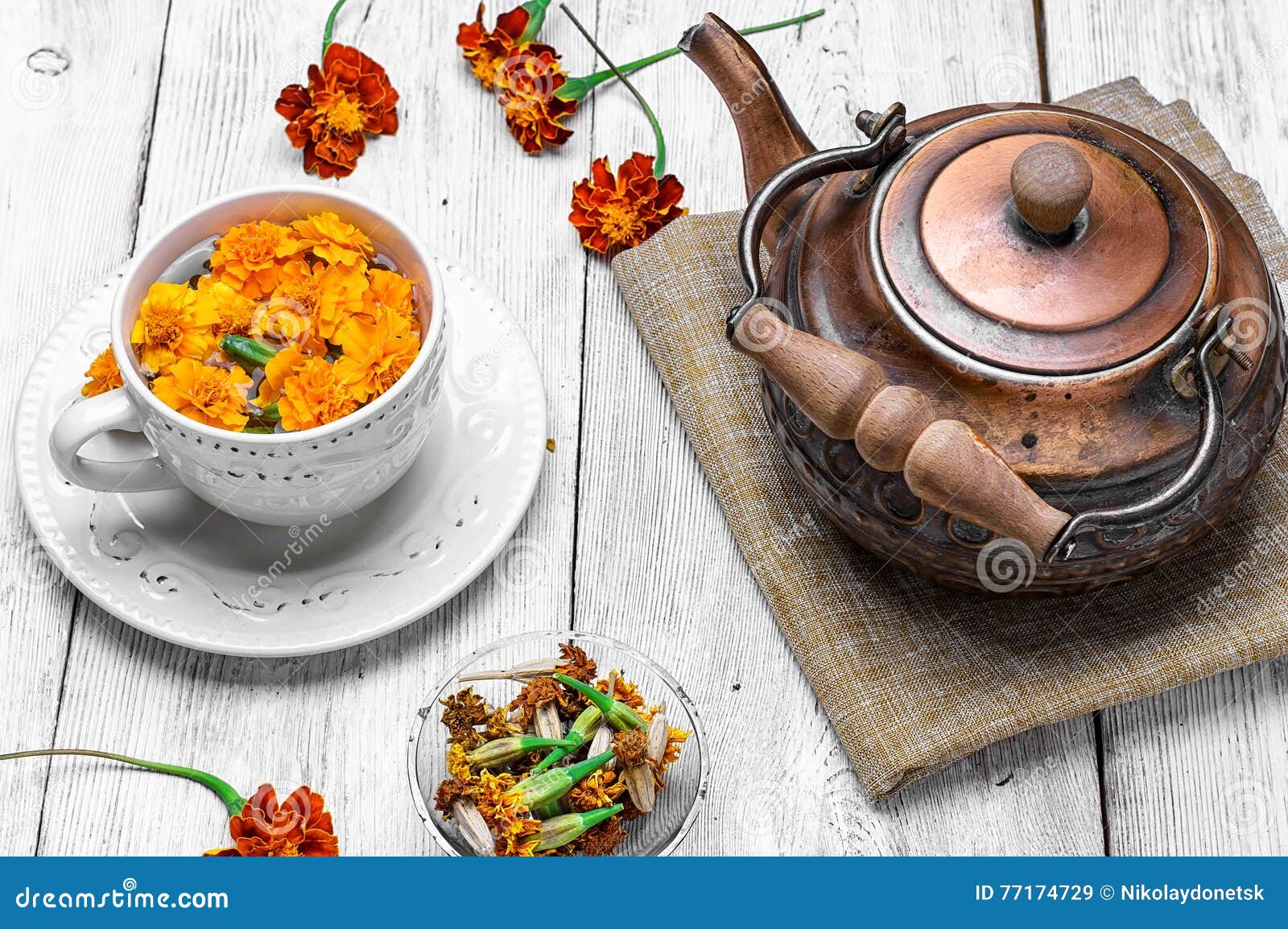 Tea with marigolds stock image. Image of teakettle, healthy 77174729