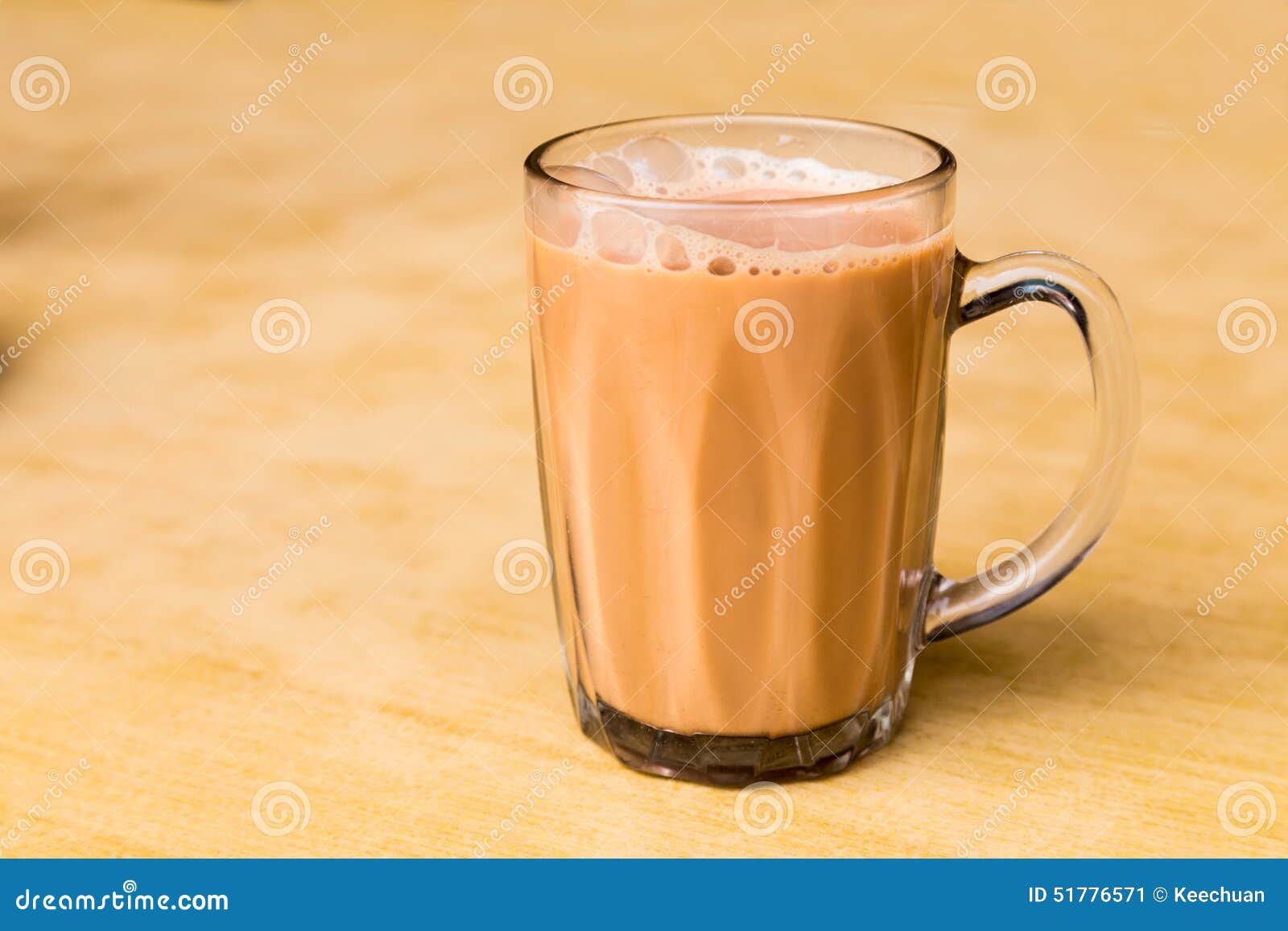 tea with milk or popularly known as teh tarik in malaysia
