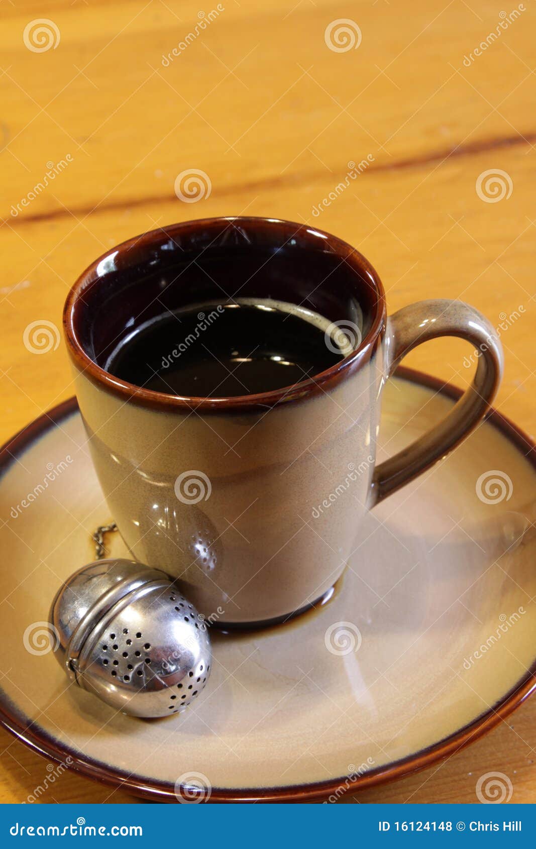 Tea Strainer and Mug stock photo. Image of caffiene, water 16124148